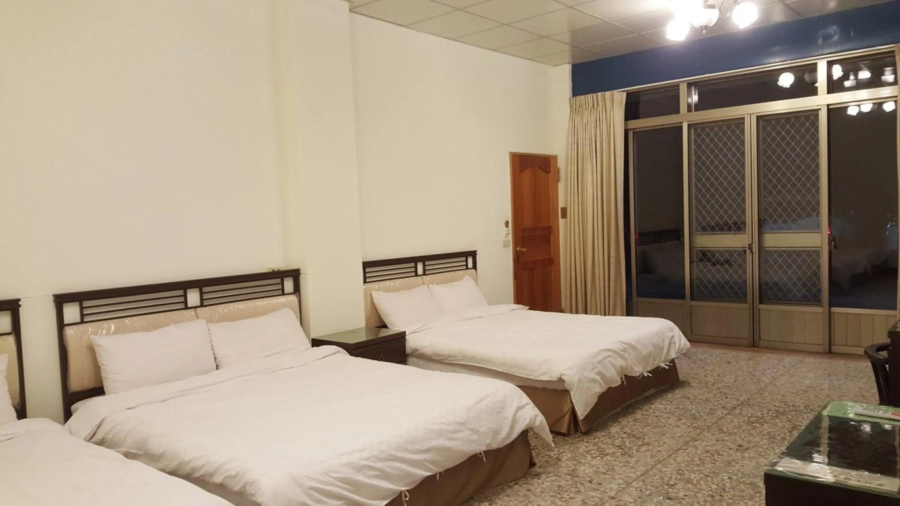 Bed in Ming Yang B&B