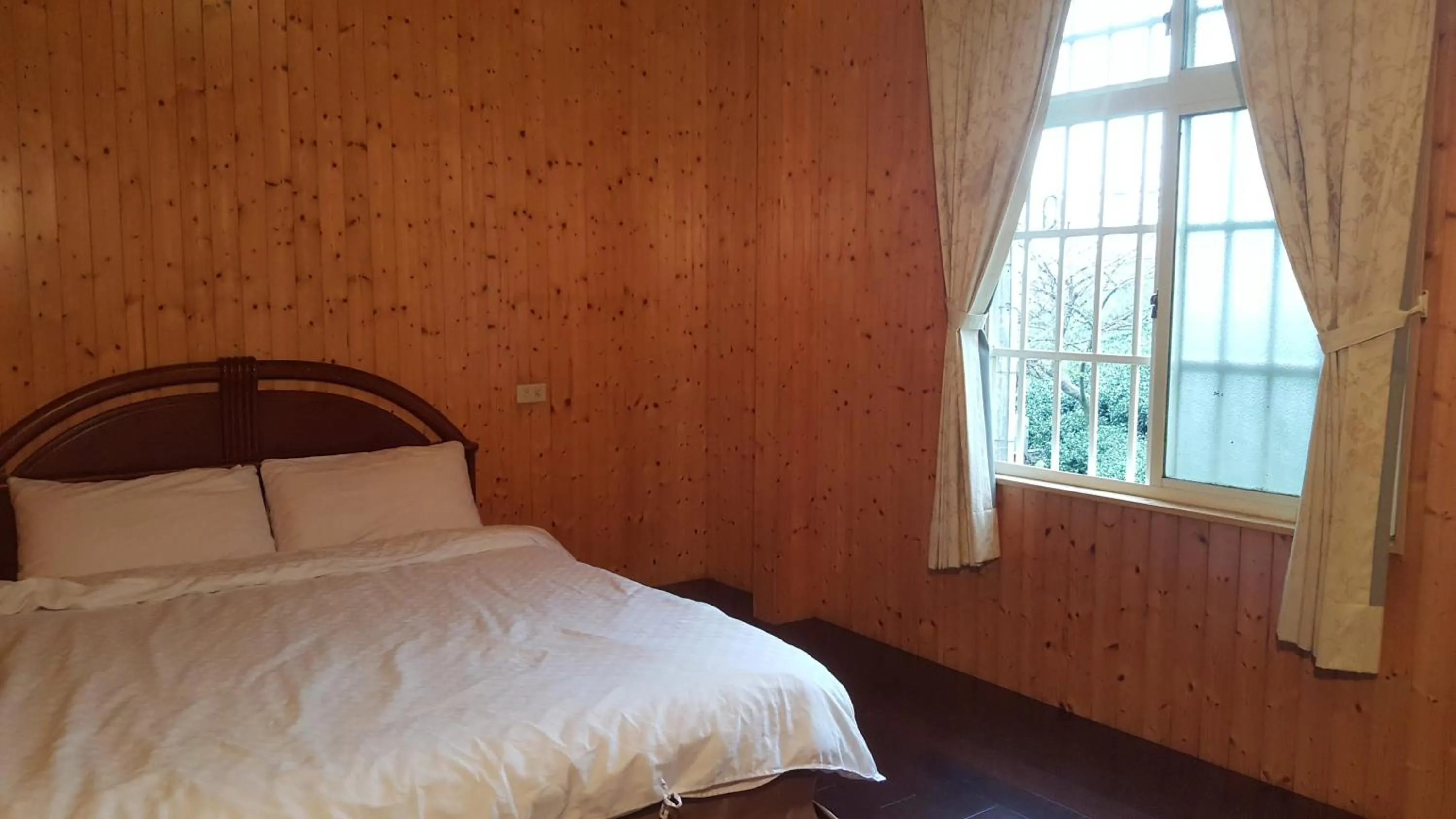 Bed in Ming Yang B&B