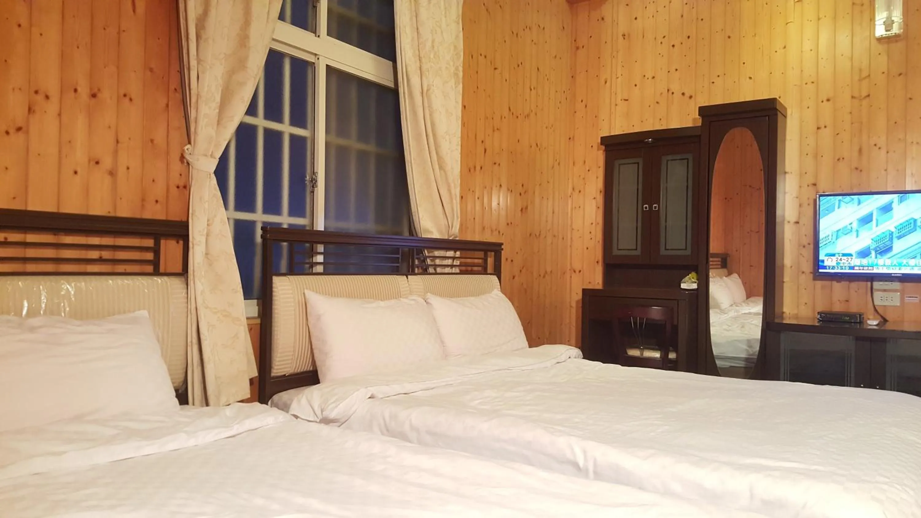 Bed in Ming Yang B&B