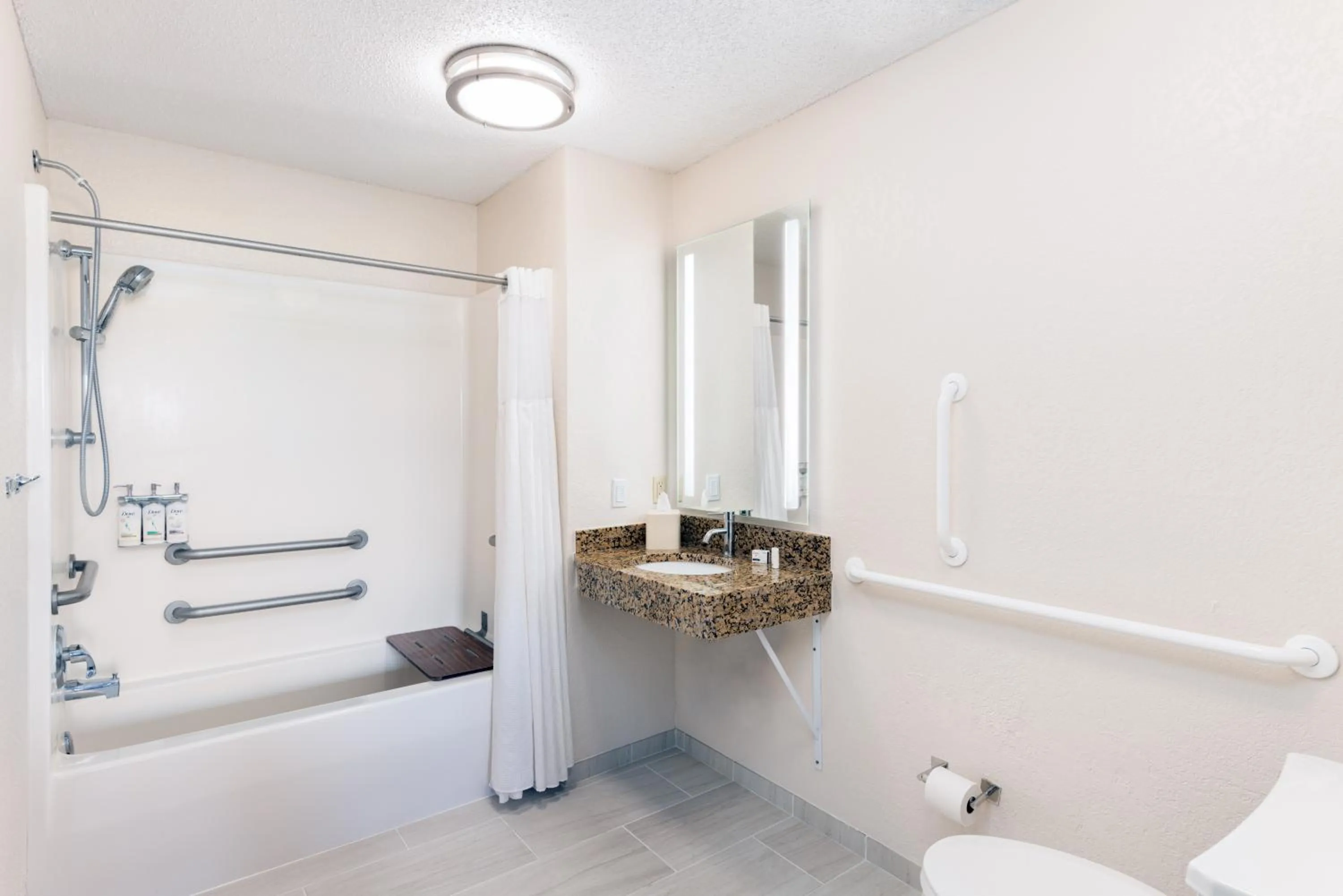 Bathroom in Candlewood Suites Eagan - Mall of America Area by IHG