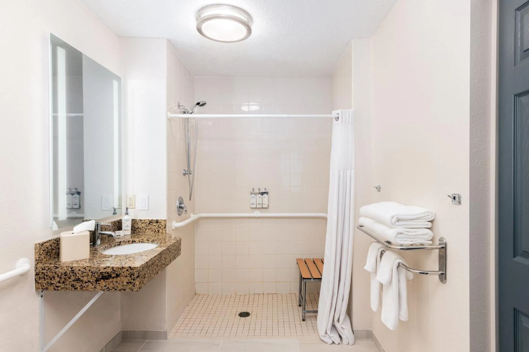 Bathroom in Candlewood Suites Eagan - Mall of America Area by IHG