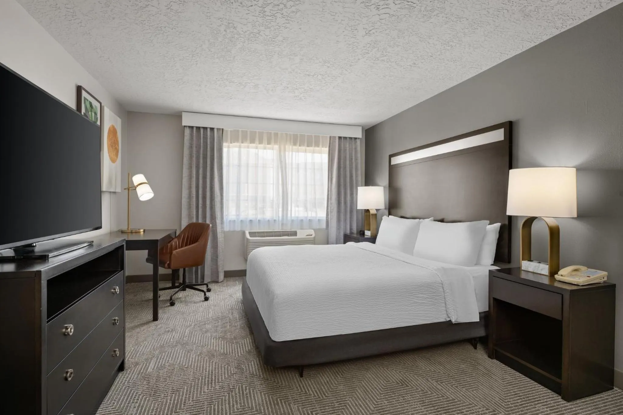 Photo of the whole room, Bed in Holiday Inn & Suites Albuquerque Airport by IHG