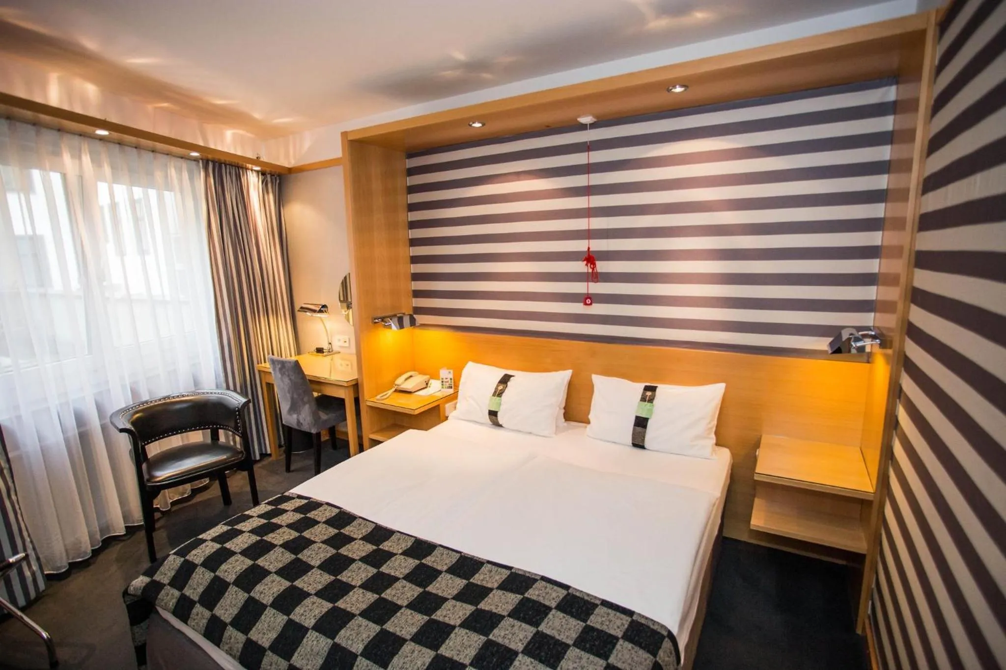 Photo of the whole room, Bed in Holiday Inn Vienna City by IHG