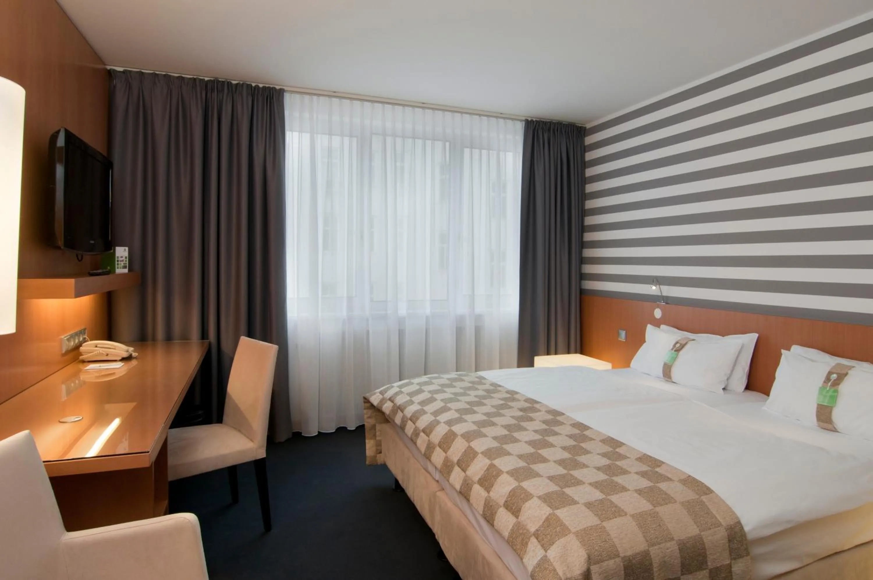 Photo of the whole room, Bed in Holiday Inn Vienna City by IHG