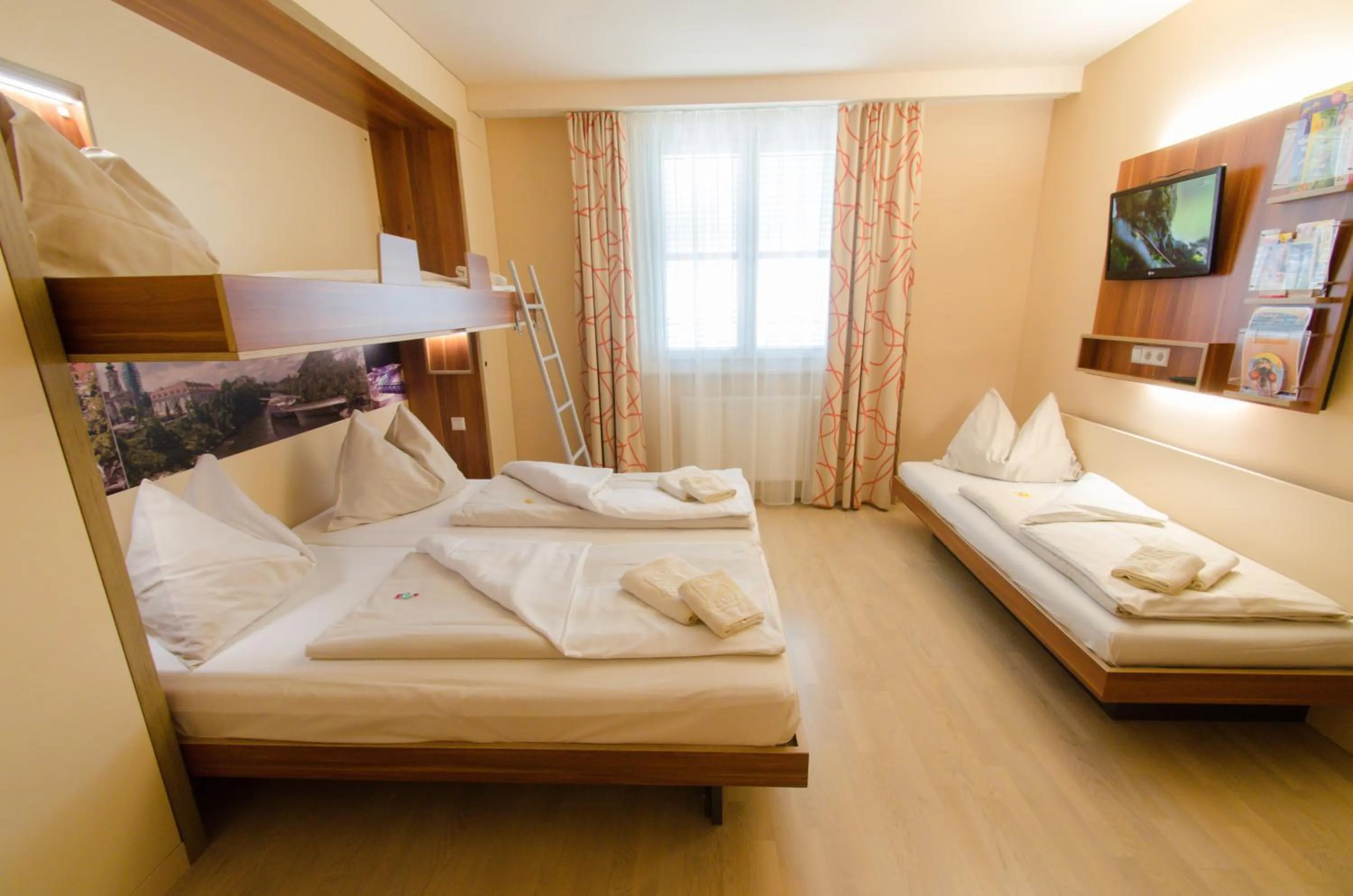 Photo of the whole room, Bed in JUFA Hotel Graz City