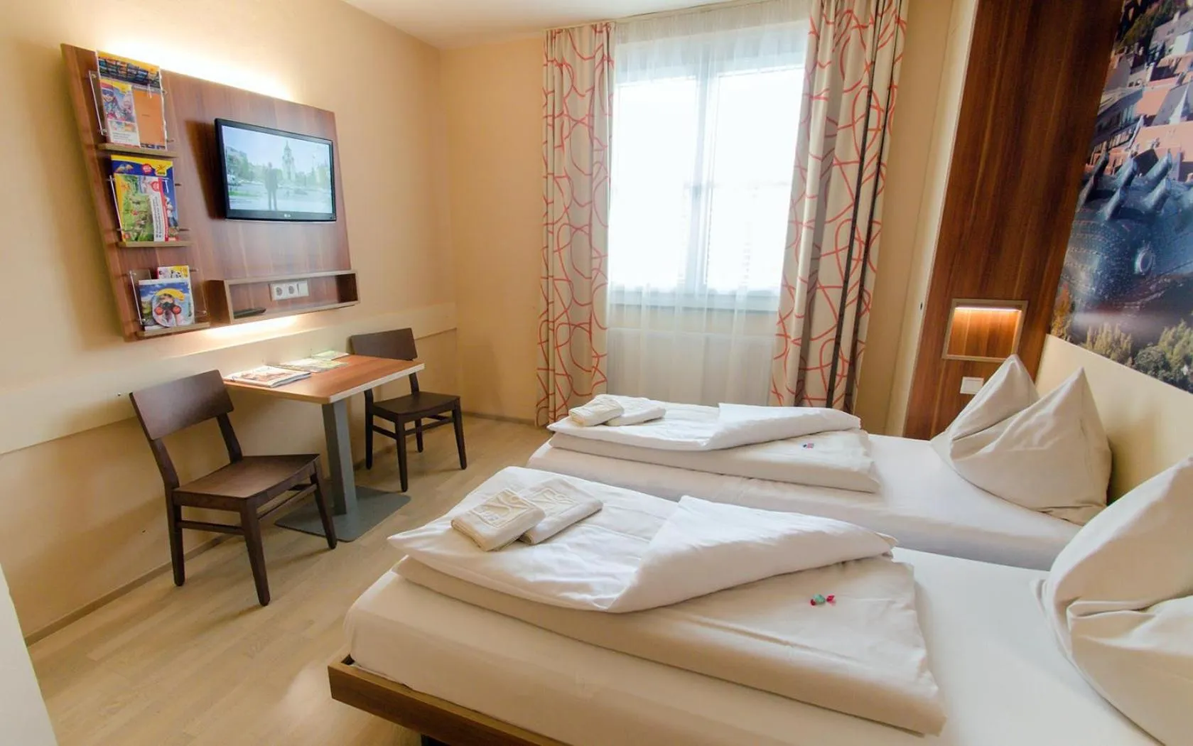 Photo of the whole room, Bed in JUFA Hotel Graz City