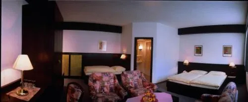 Photo of the whole room, Bed in Hotel Goldener Hirsch