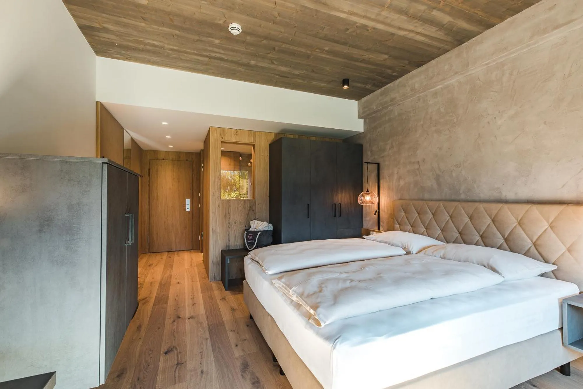 Photo of the whole room, Bed in Seehotel Einwaller - adults only