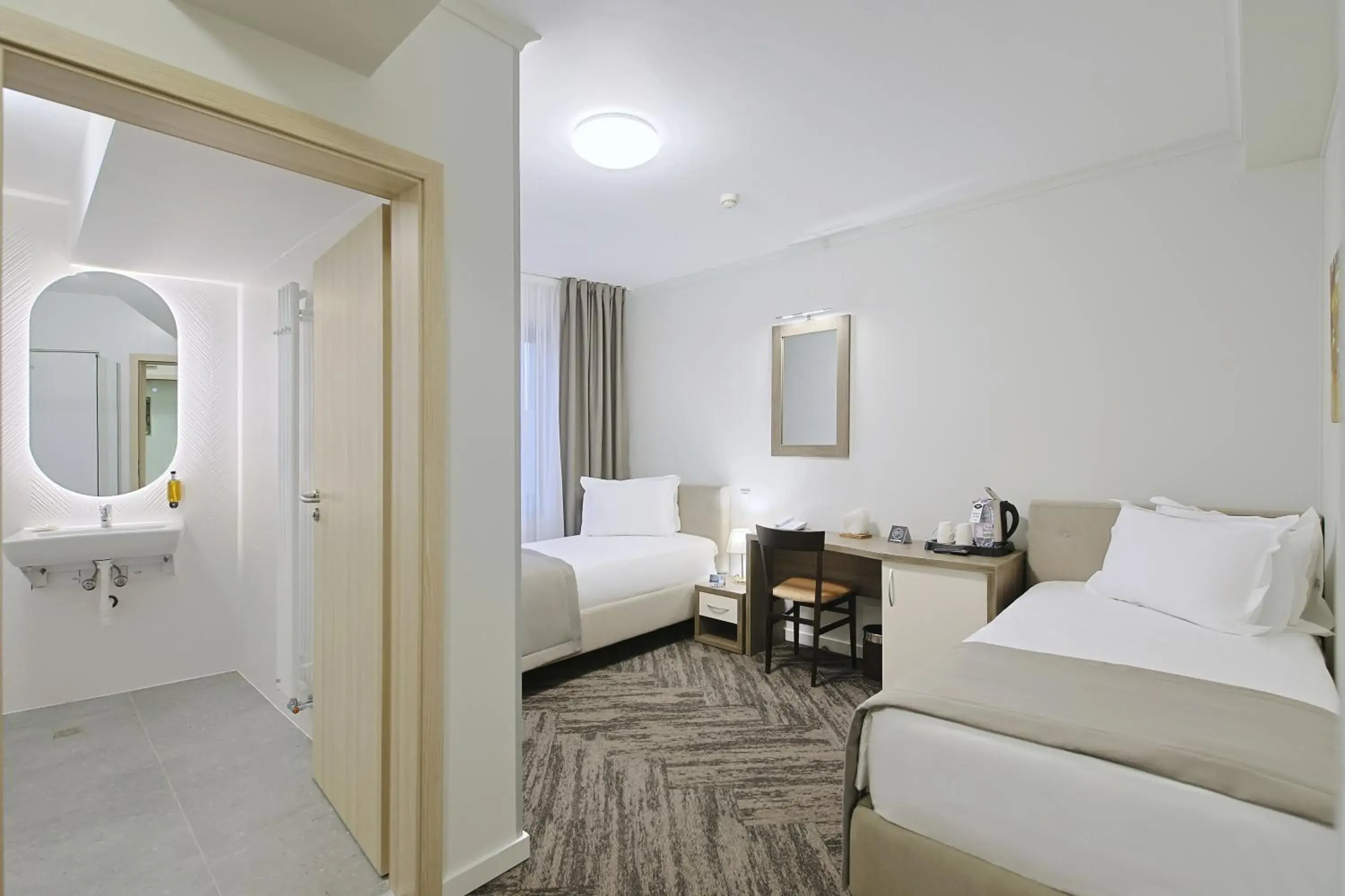 Twin Room - single occupancy - Disability Access in Potaissa Hotel Twin Room - single occupancy - Disability Access in Potaissa Hotel