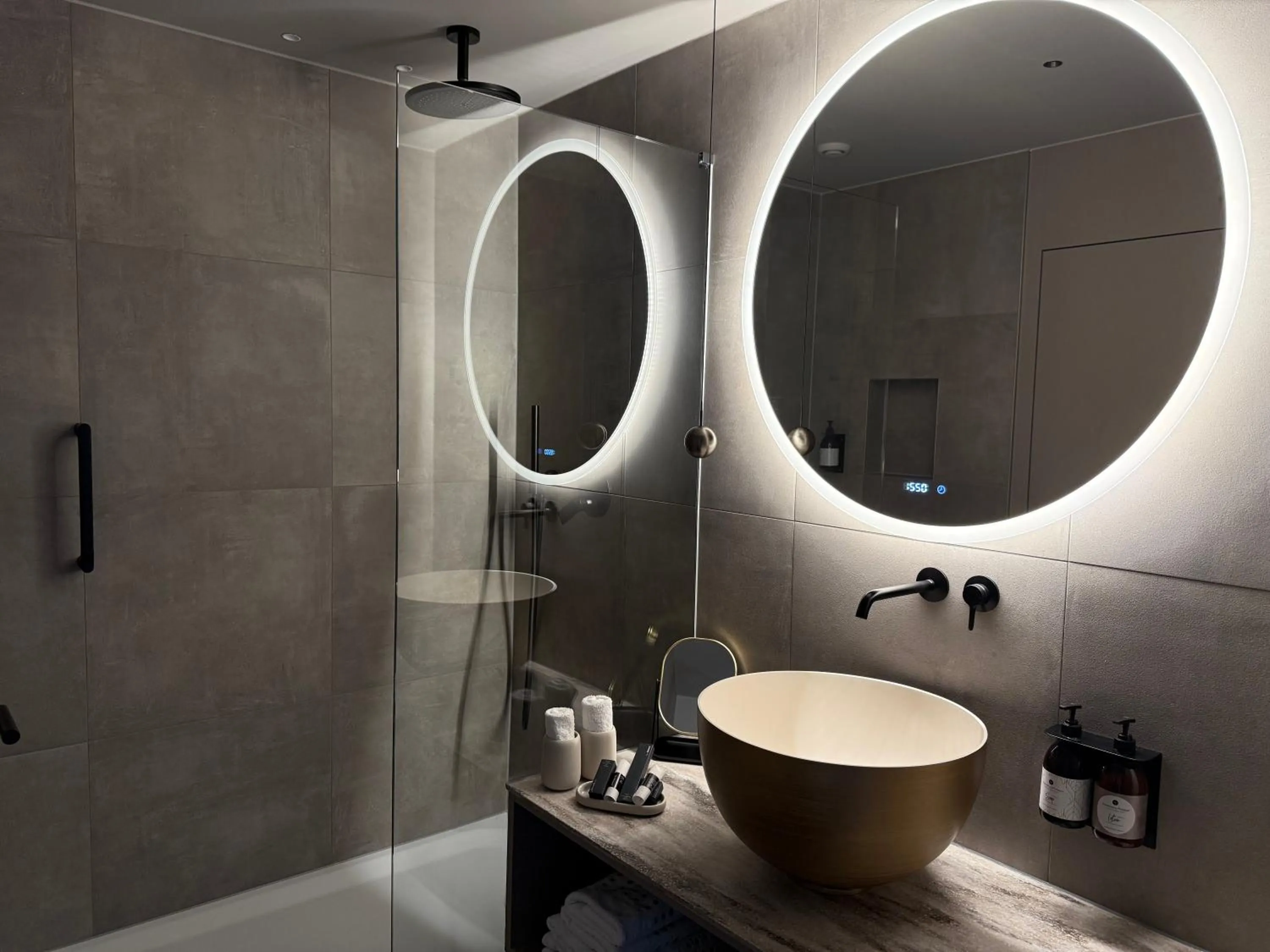 Bathroom in hirschen dornbirn - das boutiquestyle hotel - skyrelax & wellness im rooftop