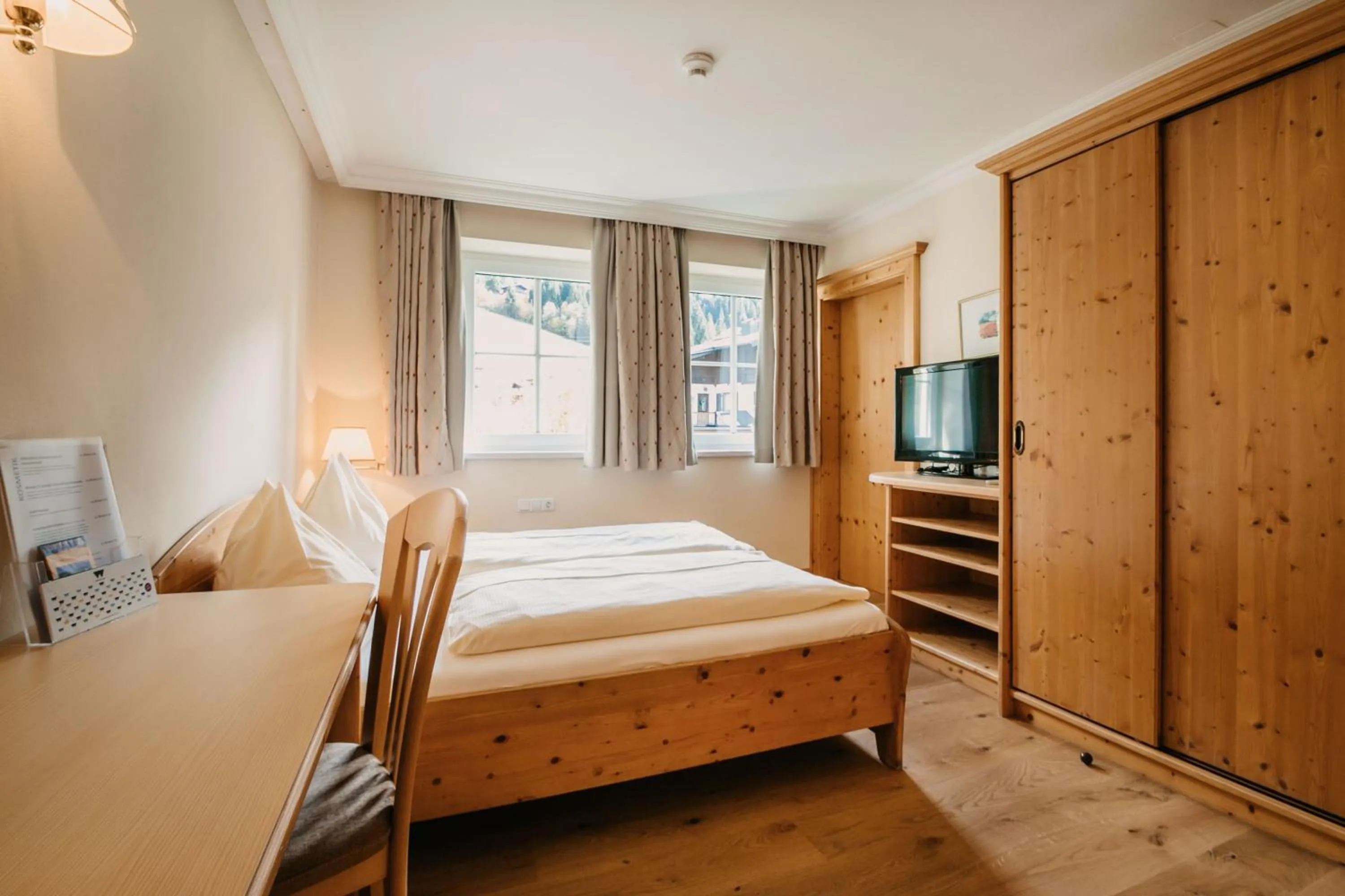 Photo of the whole room, Bed in Hotel Guggenberger