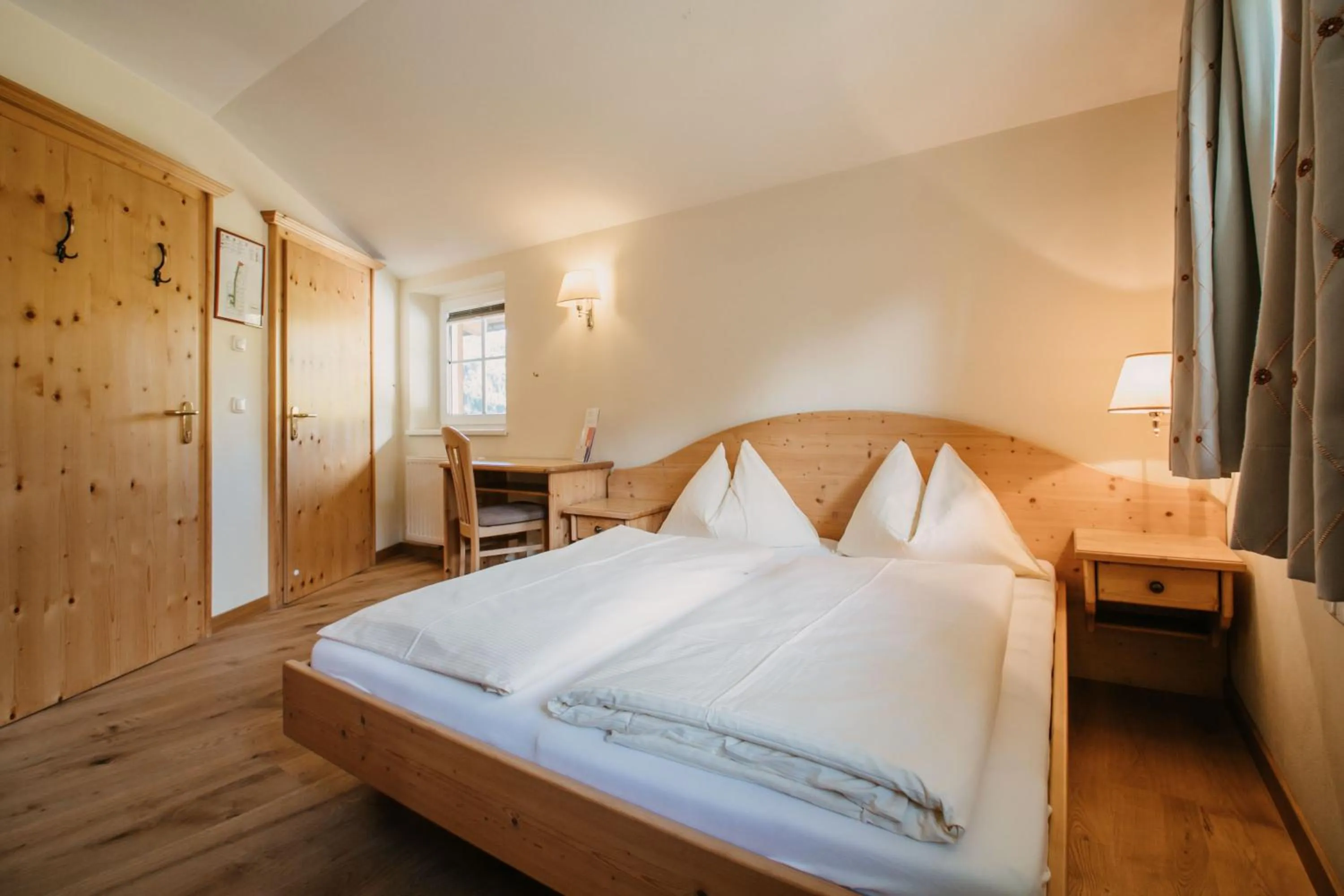 Photo of the whole room, Bed in Hotel Guggenberger