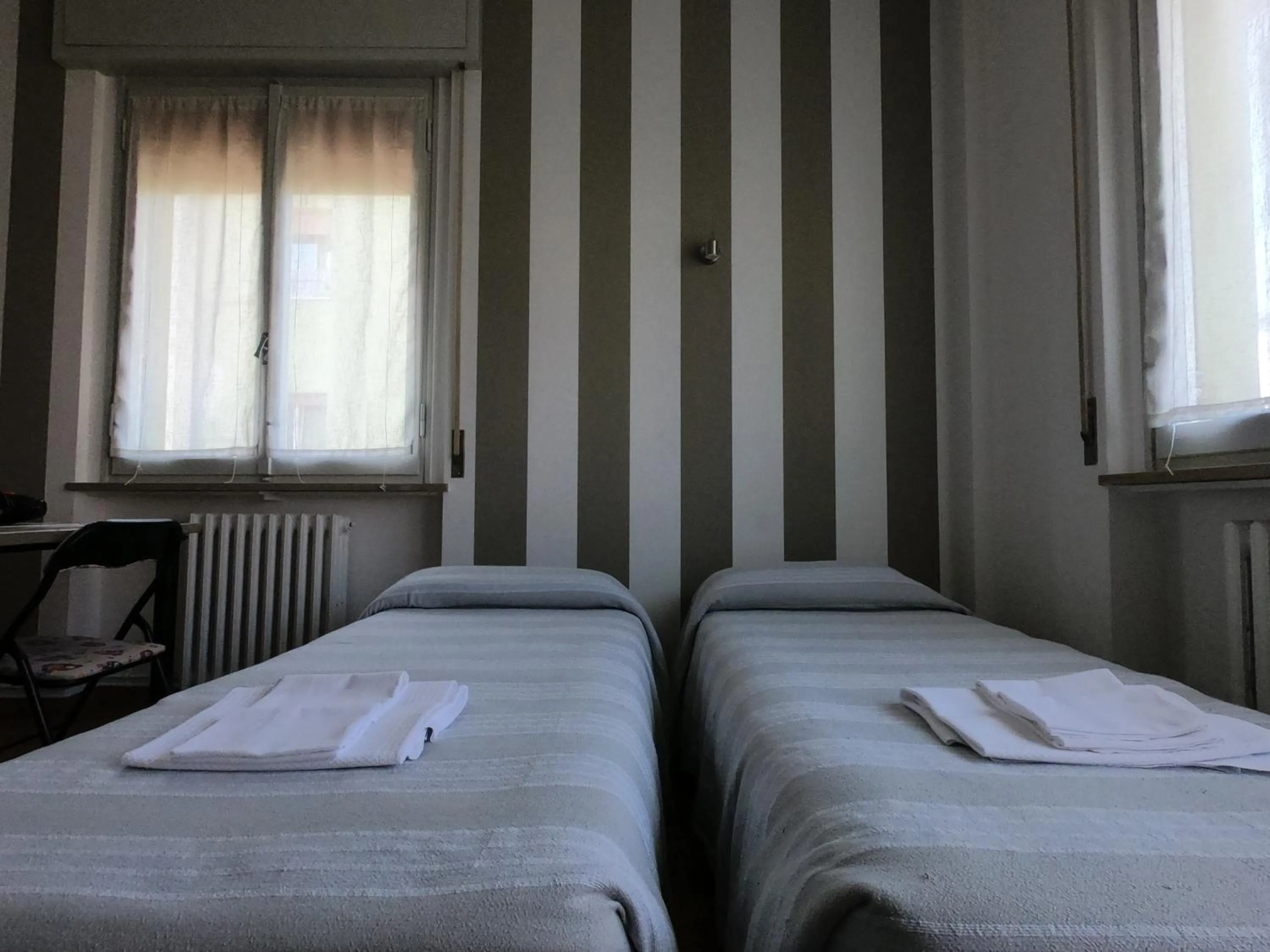 Bed in Gardenia Guest House