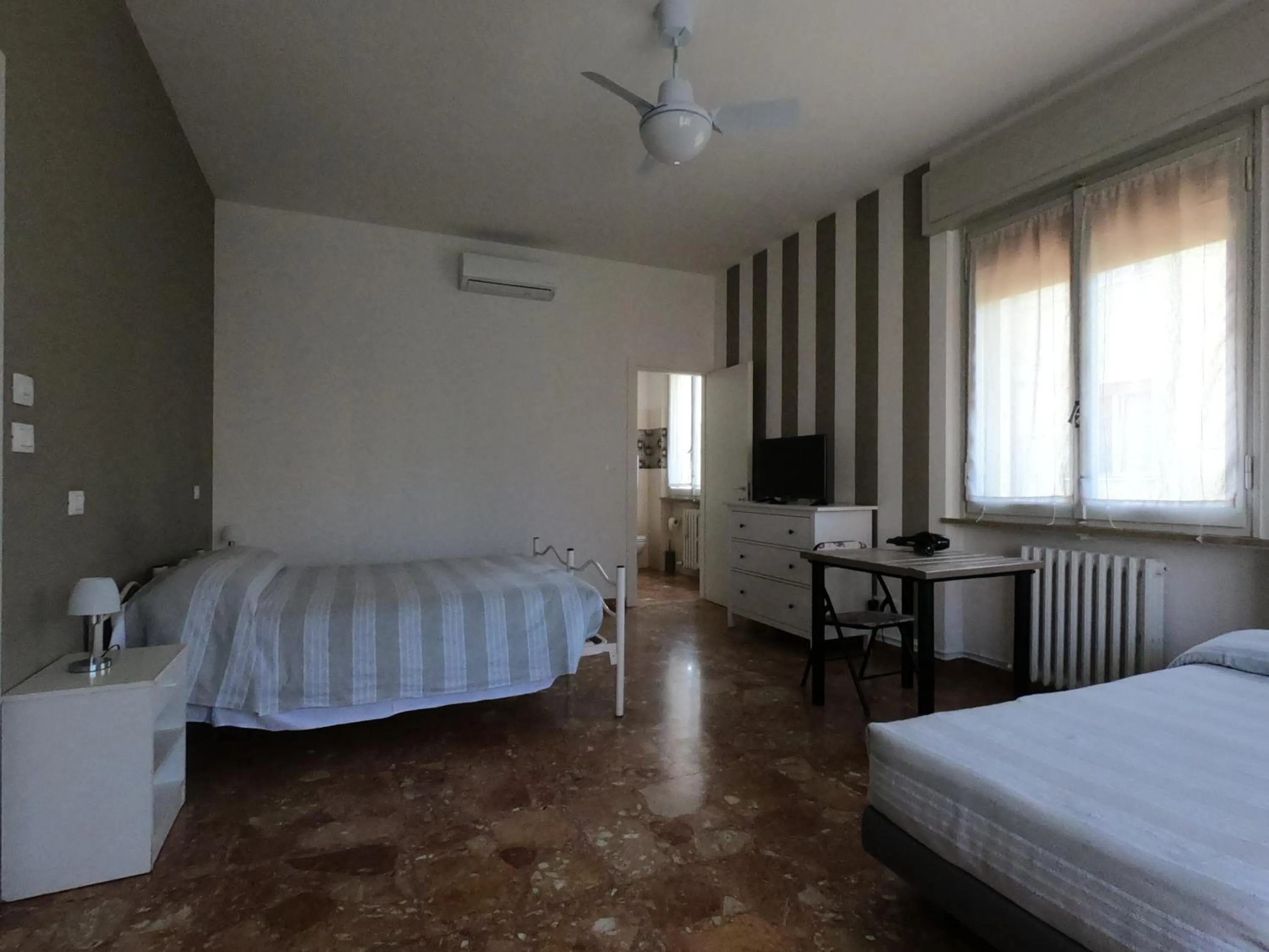 Bed in Gardenia Guest House