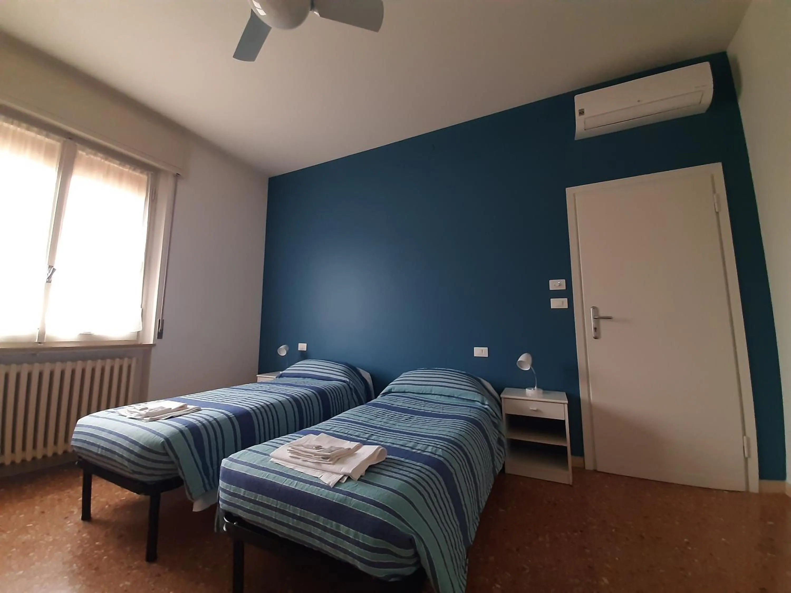 Bed in Gardenia Guest House