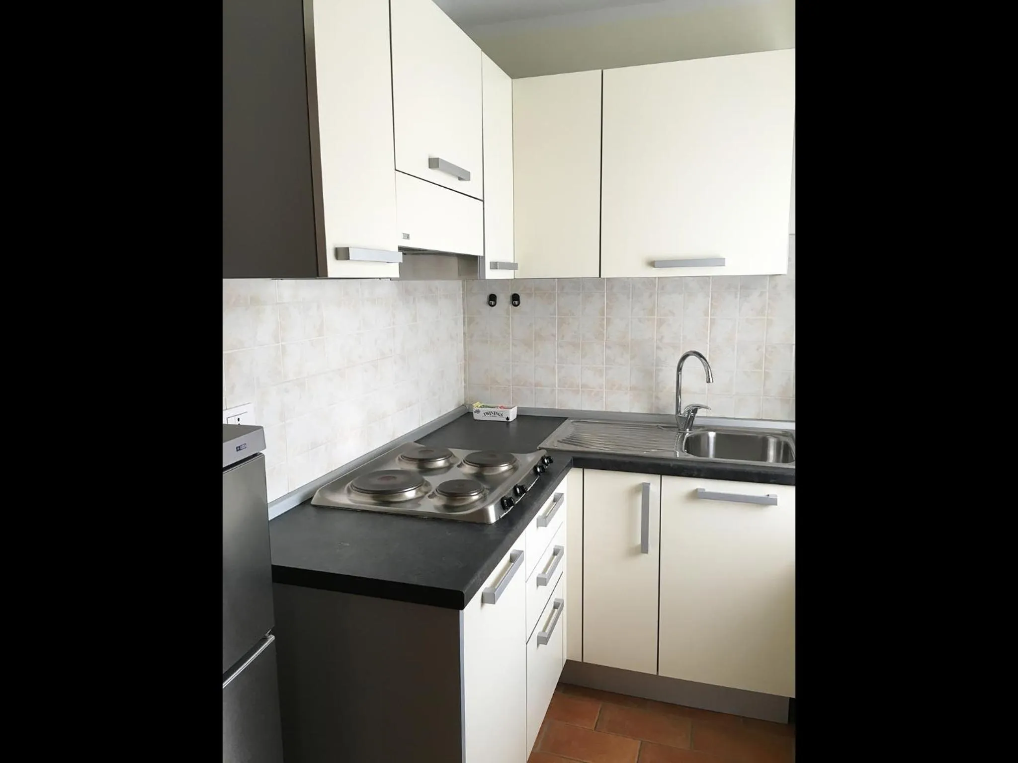 Kitchen or kitchenette in R.T.A. Hotel Monte Rosa