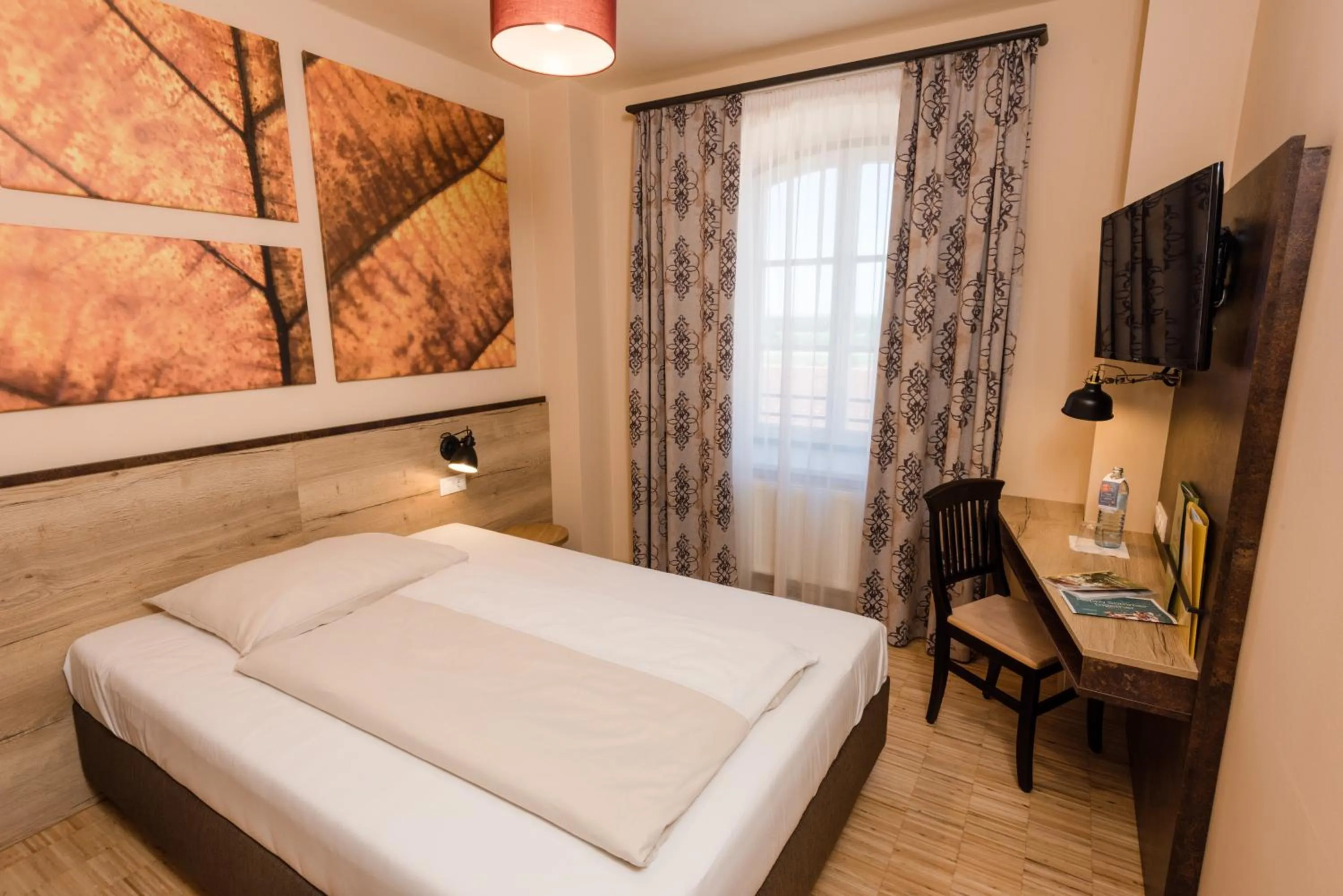 Photo of the whole room, Bed in JUFA Hotel Fürstenfeld