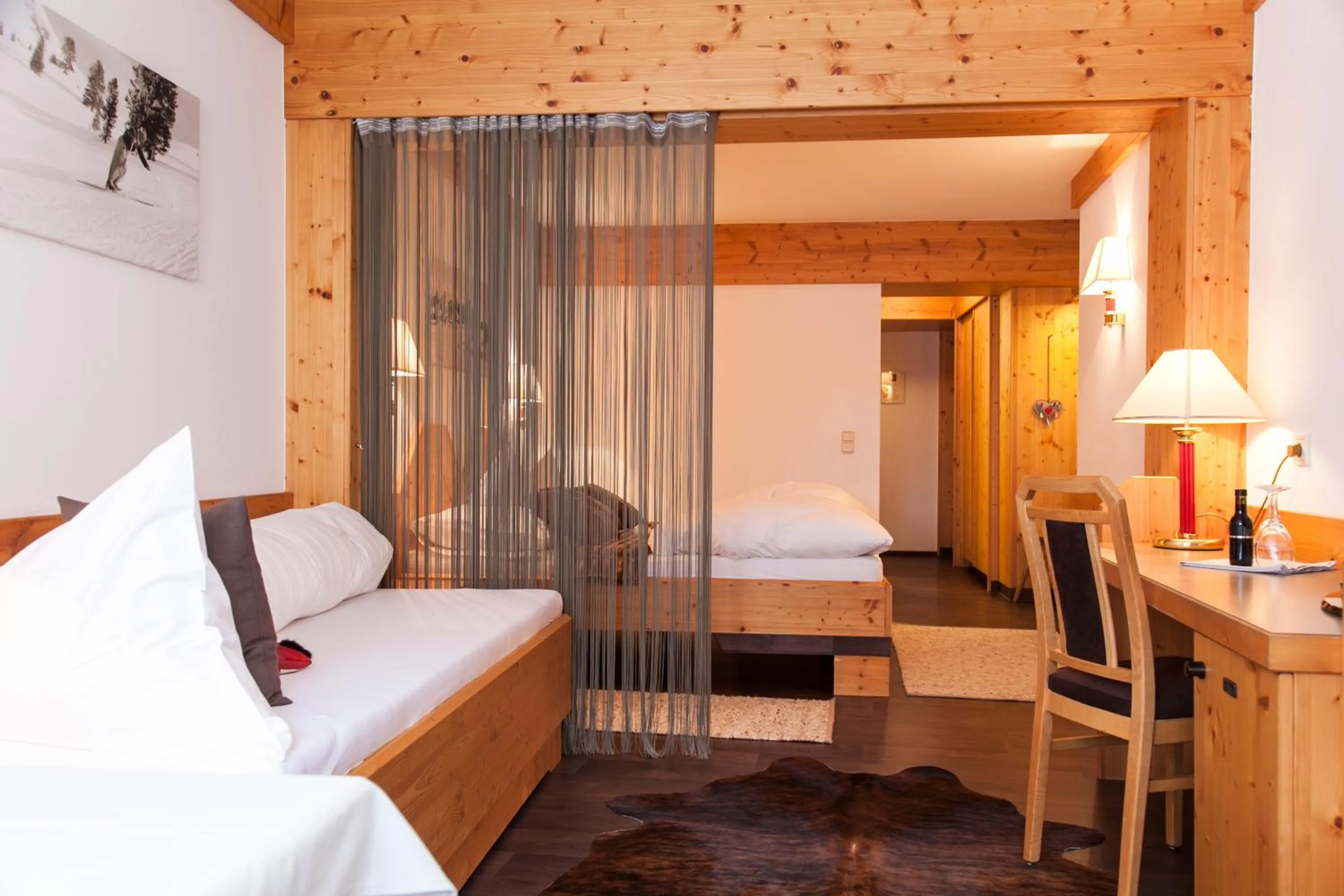 Photo of the whole room, Bed in Am Dorfplatz Suites - Adults friendly