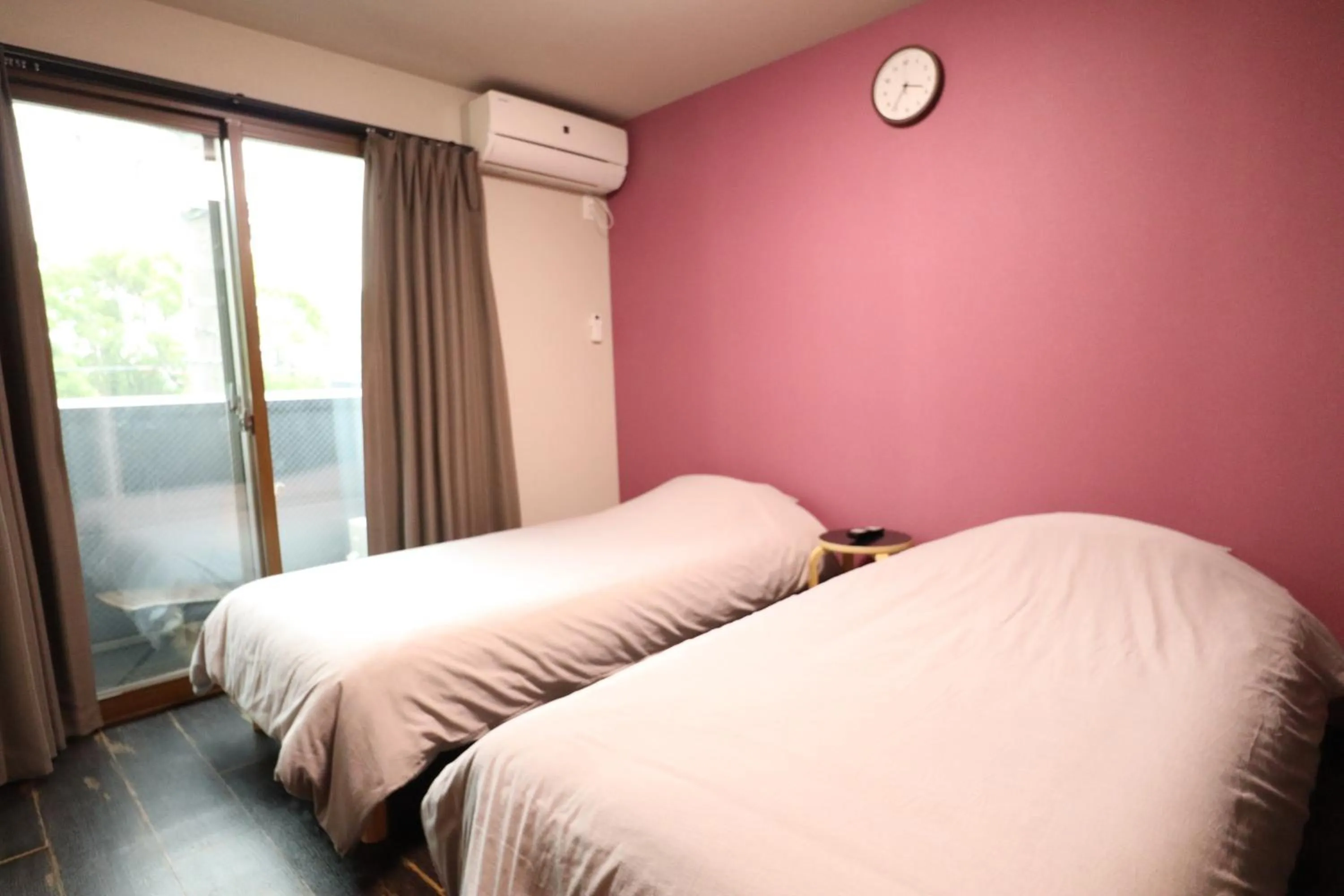 Bed in Kyostay Iroha Toji Annex