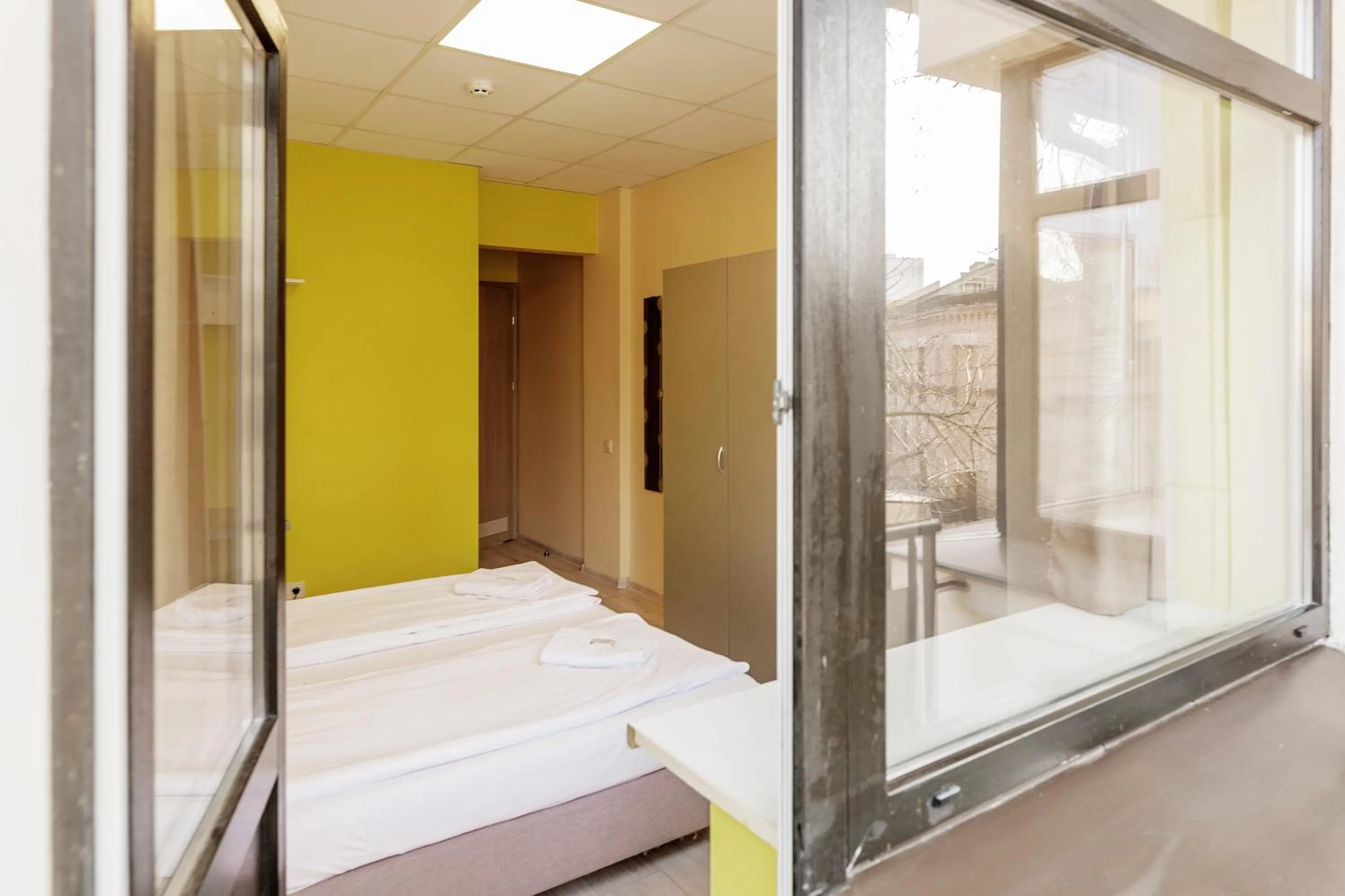 Photo of the whole room, Bed in Bridge Hotel Riga Free PARKING