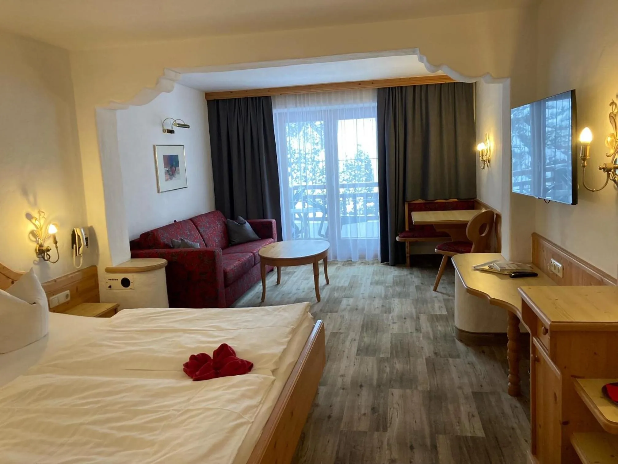 Seating area, Bed in Hotel Metzgerwirt