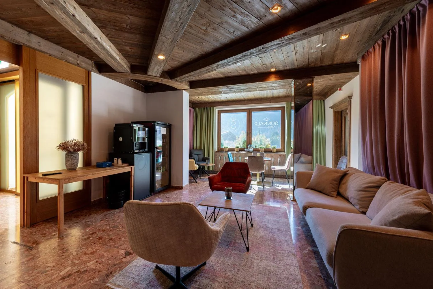 Communal lounge/ TV room in Garni Das SONNALP