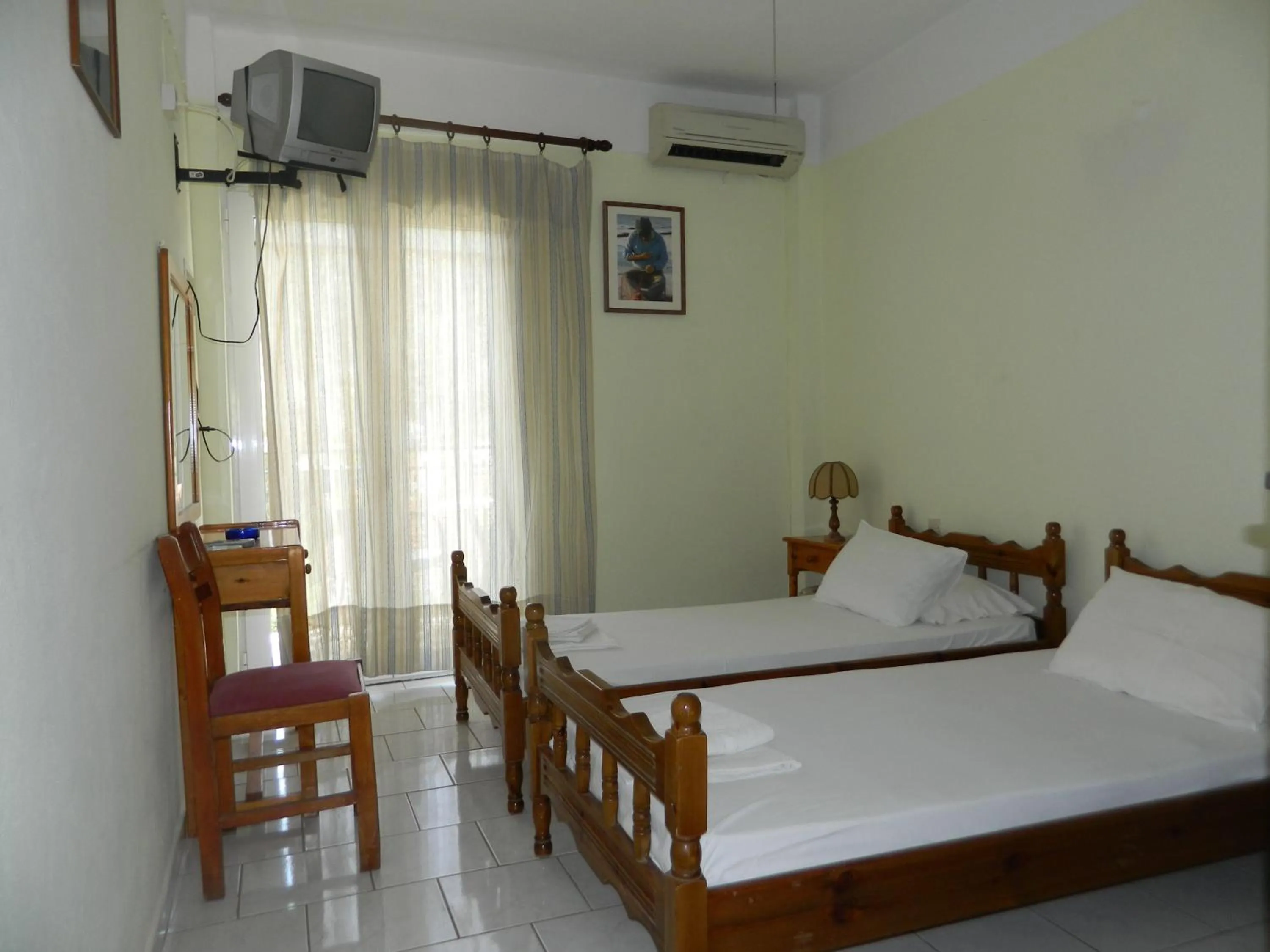 Bedroom in Logara's Apartments