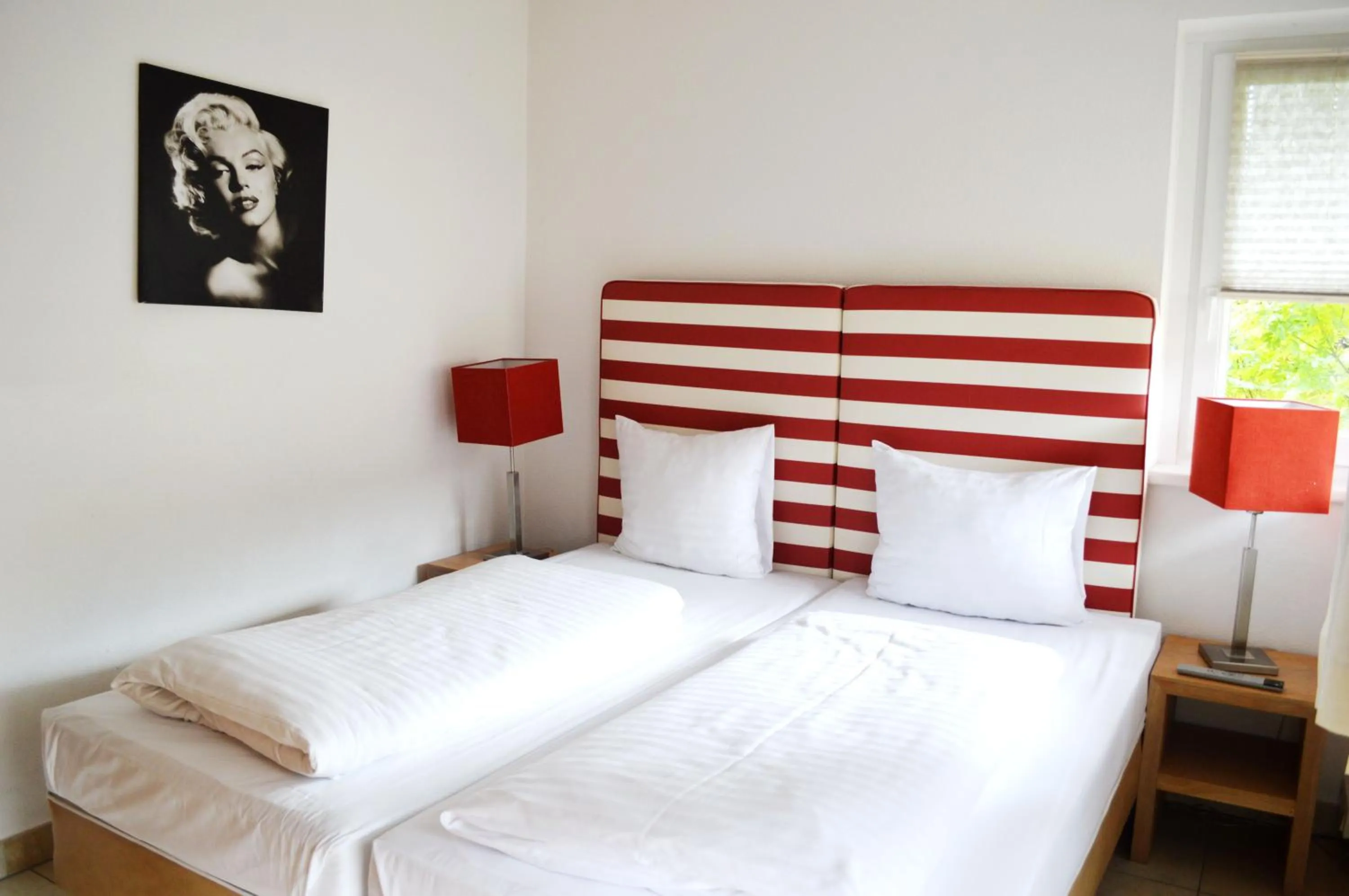 Bed in AvenidA Style Appartements by Alpin Rentals
