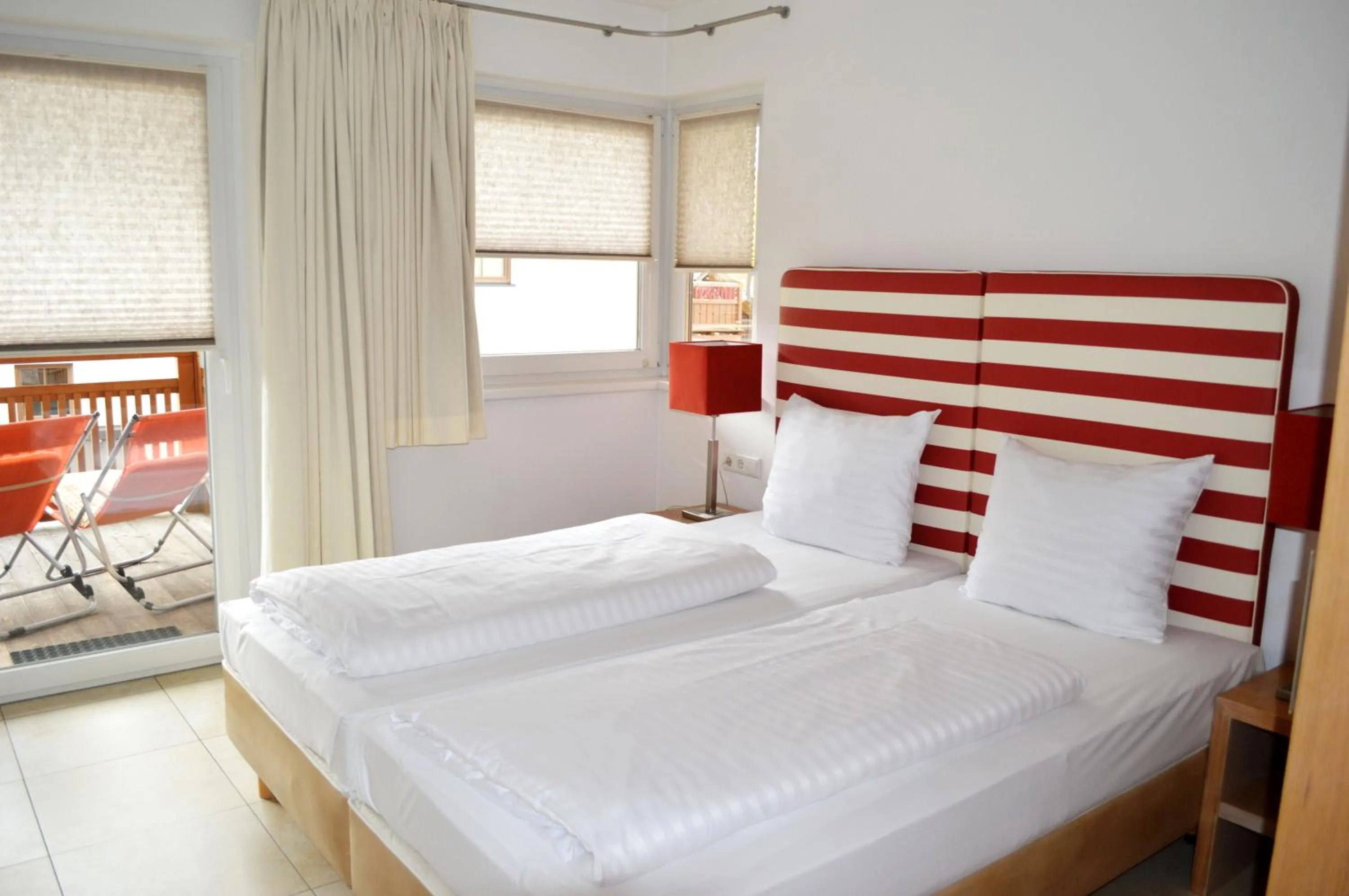 Bed in AvenidA Style Appartements by Alpin Rentals