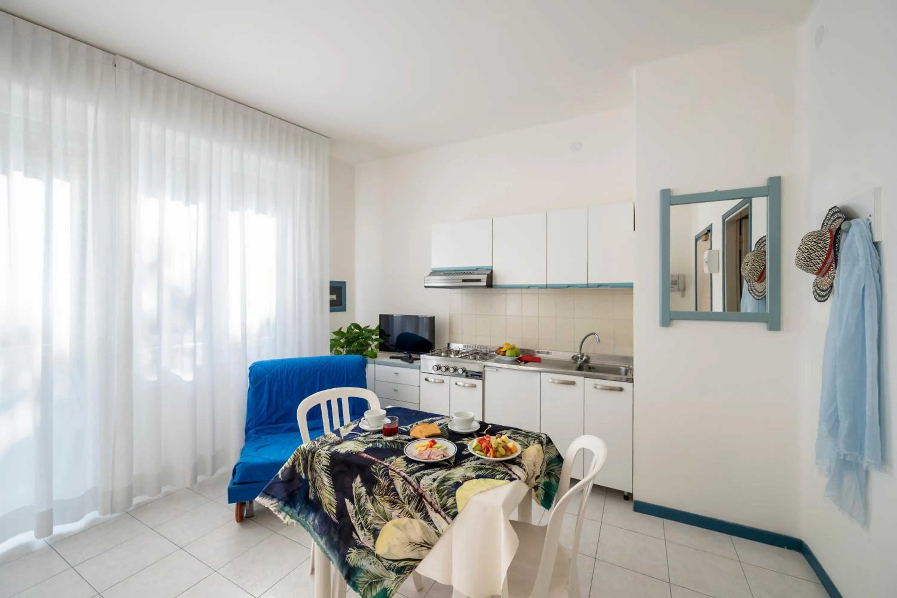 Kitchen or kitchenette in Aparthotel Pineda