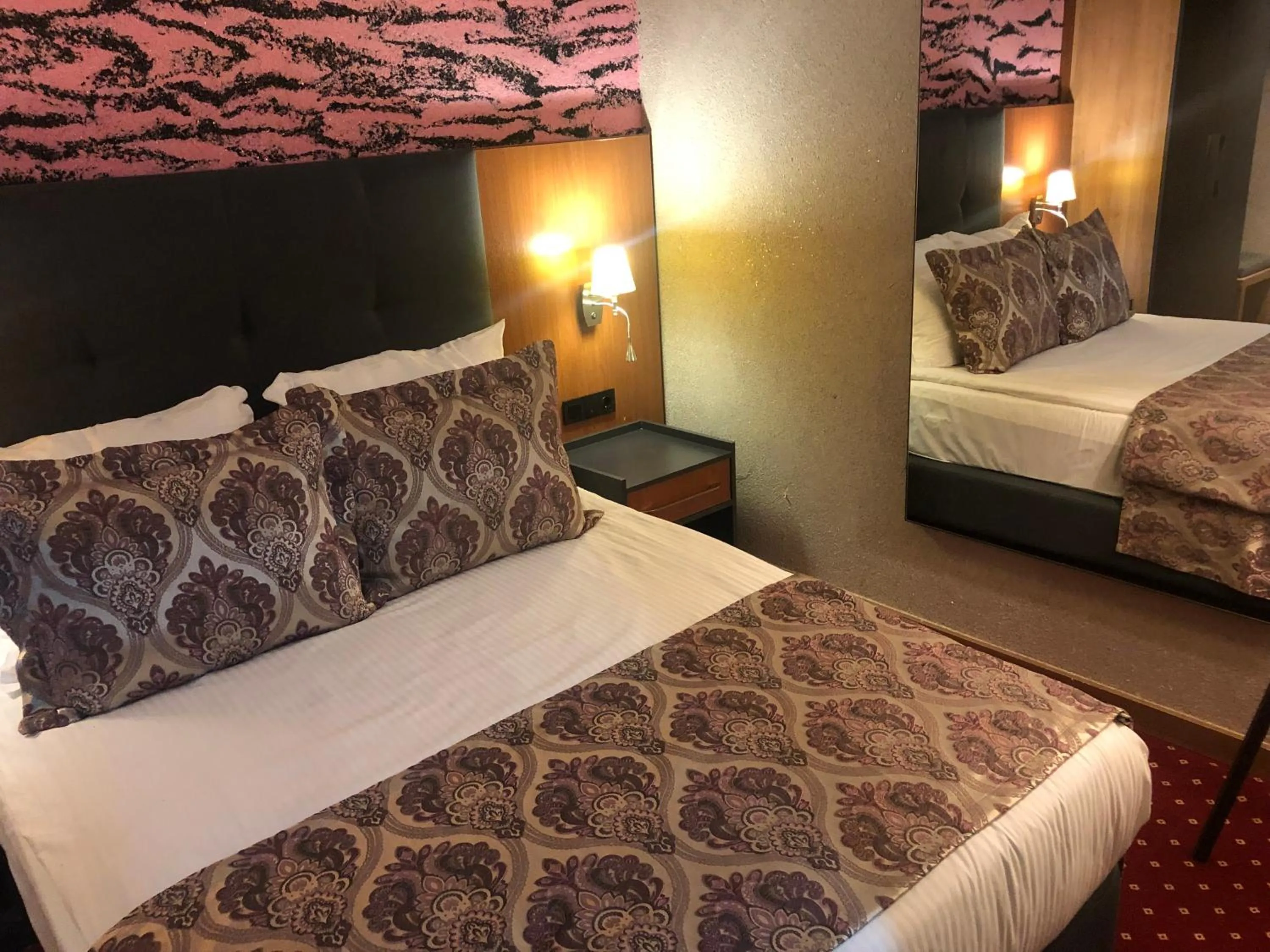 Bed in Euphoria Batumi Convention & Casino Hotel