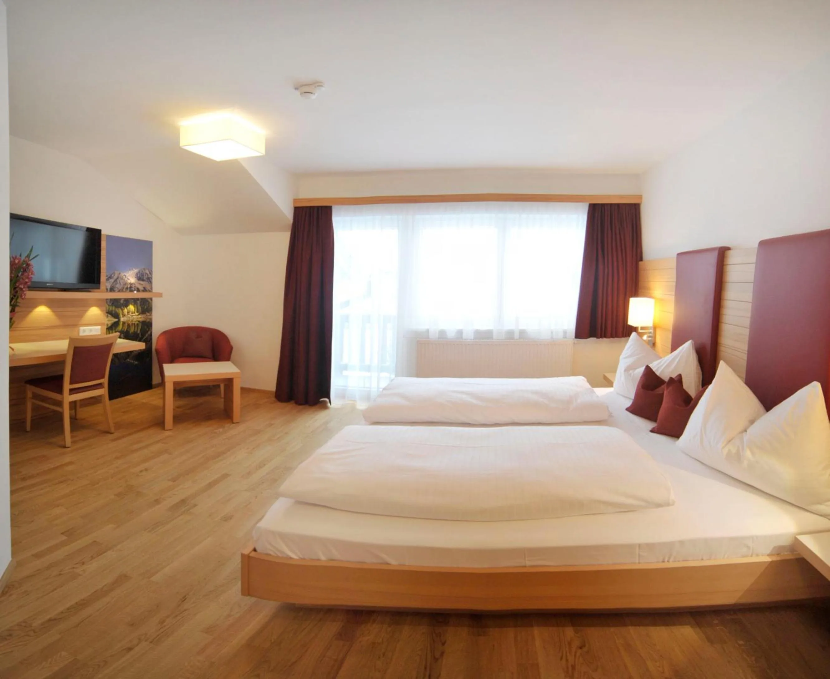 Bed in Hotel Sonnschupfer