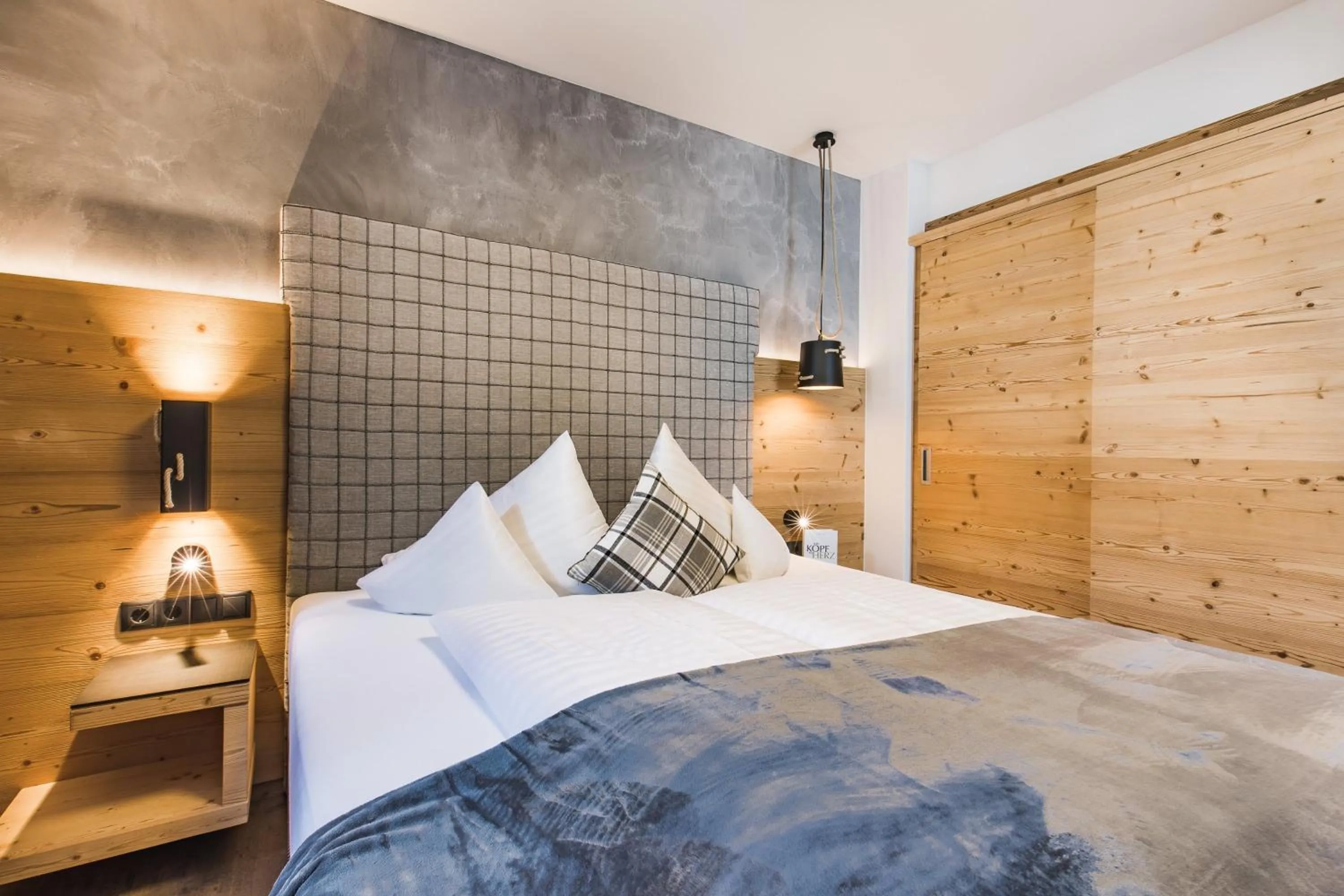 Bed in Hotel Vier Jahreszeiten