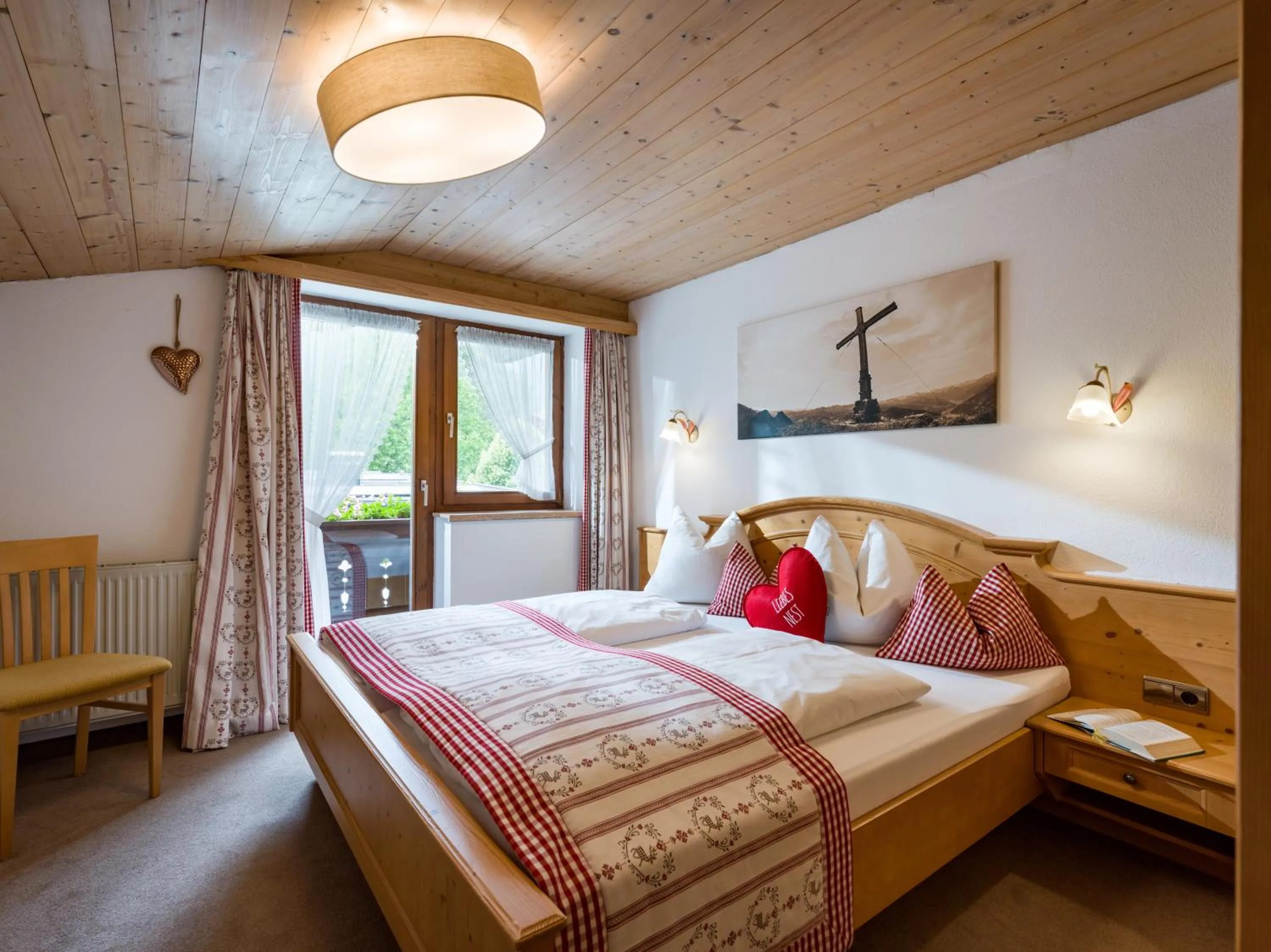Photo of the whole room, Bed in Hotel Landhaus Zillertal