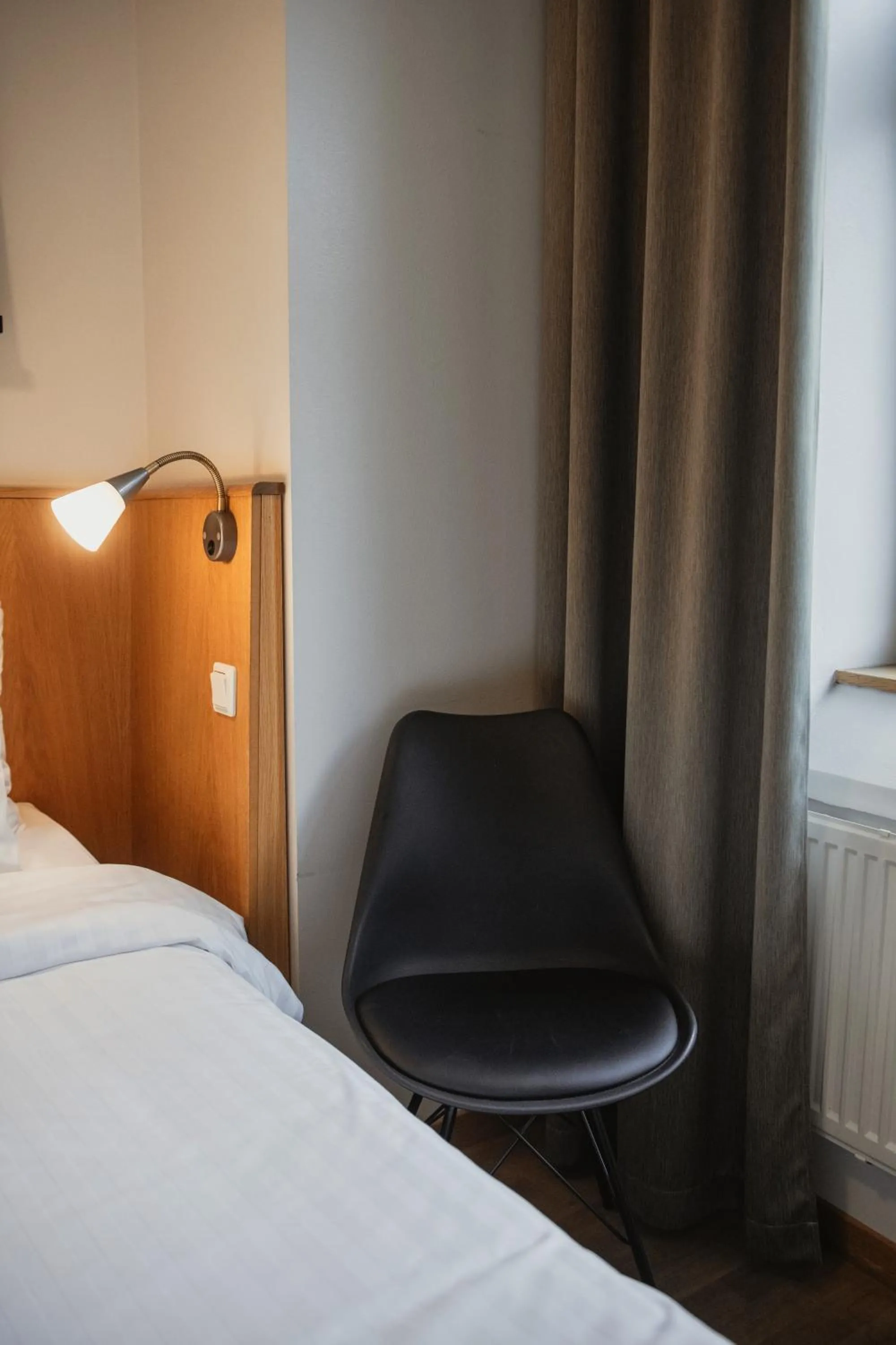 Photo of the whole room, Bed in Home Hotel Uppsala