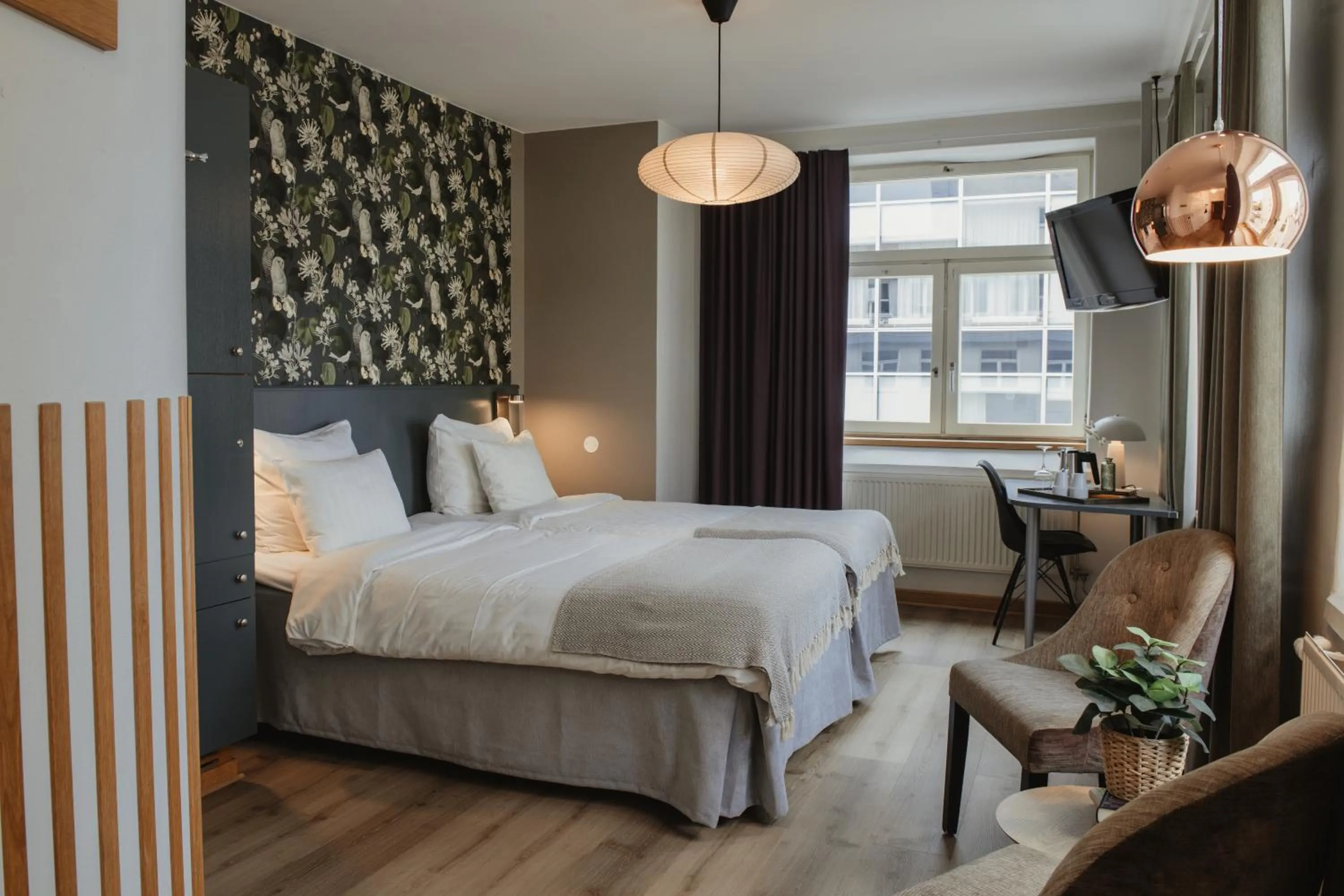 Photo of the whole room, Bed in Home Hotel Uppsala