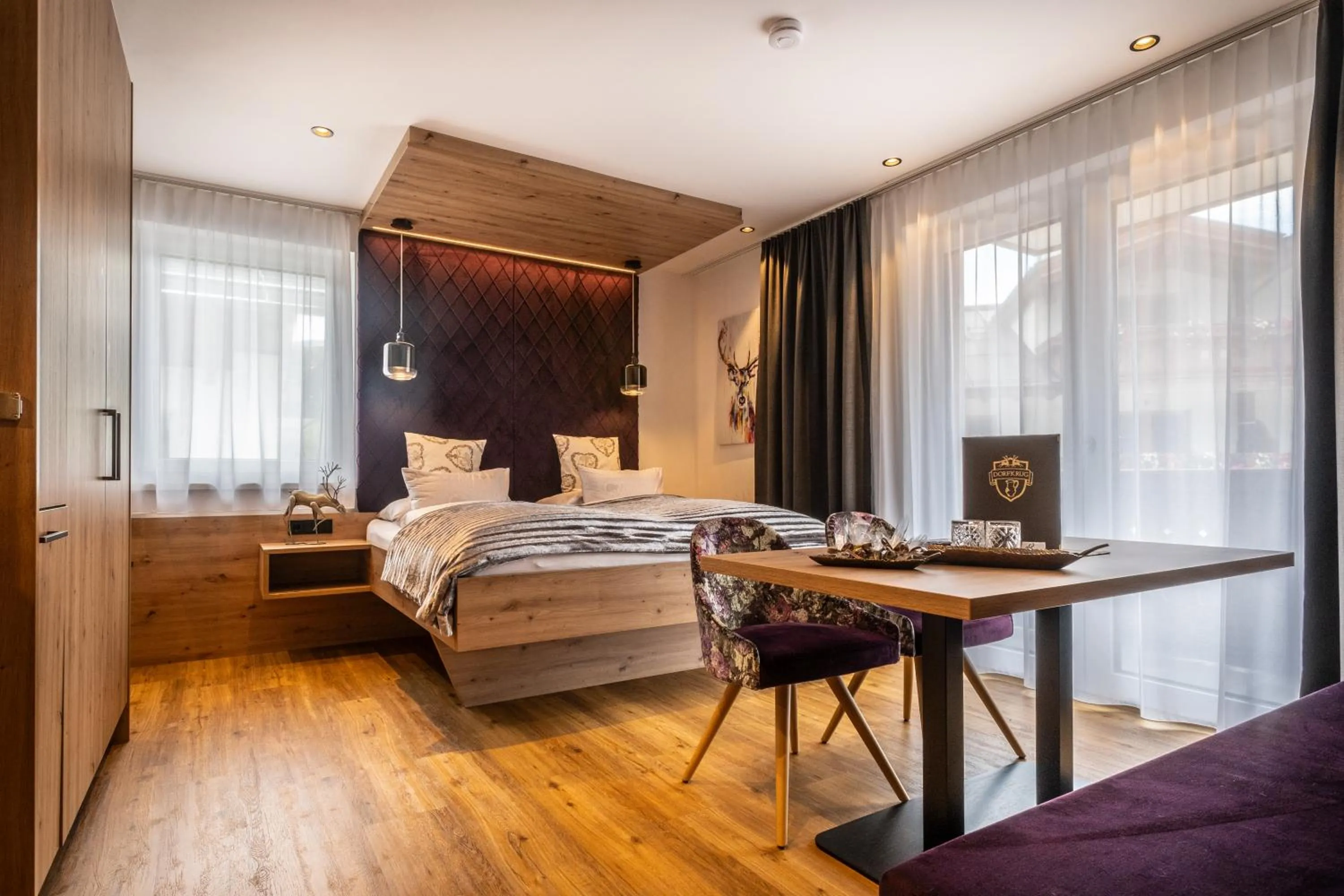 Bed in Dorfkrug Kaprun - Luxury Suites & Appartements