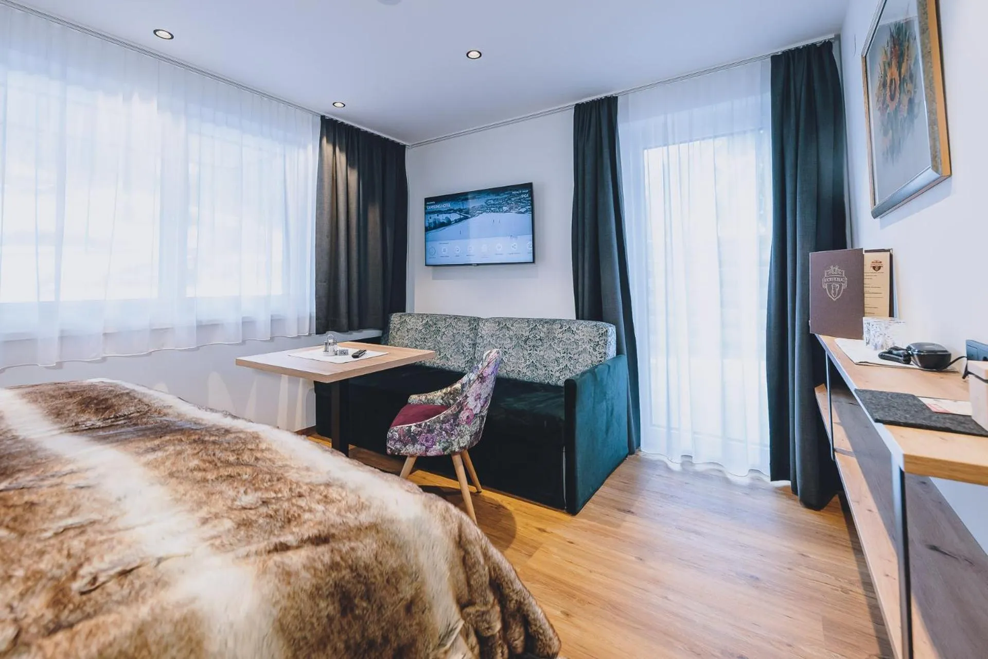 Seating area in Dorfkrug Kaprun - Luxury Suites & Appartements