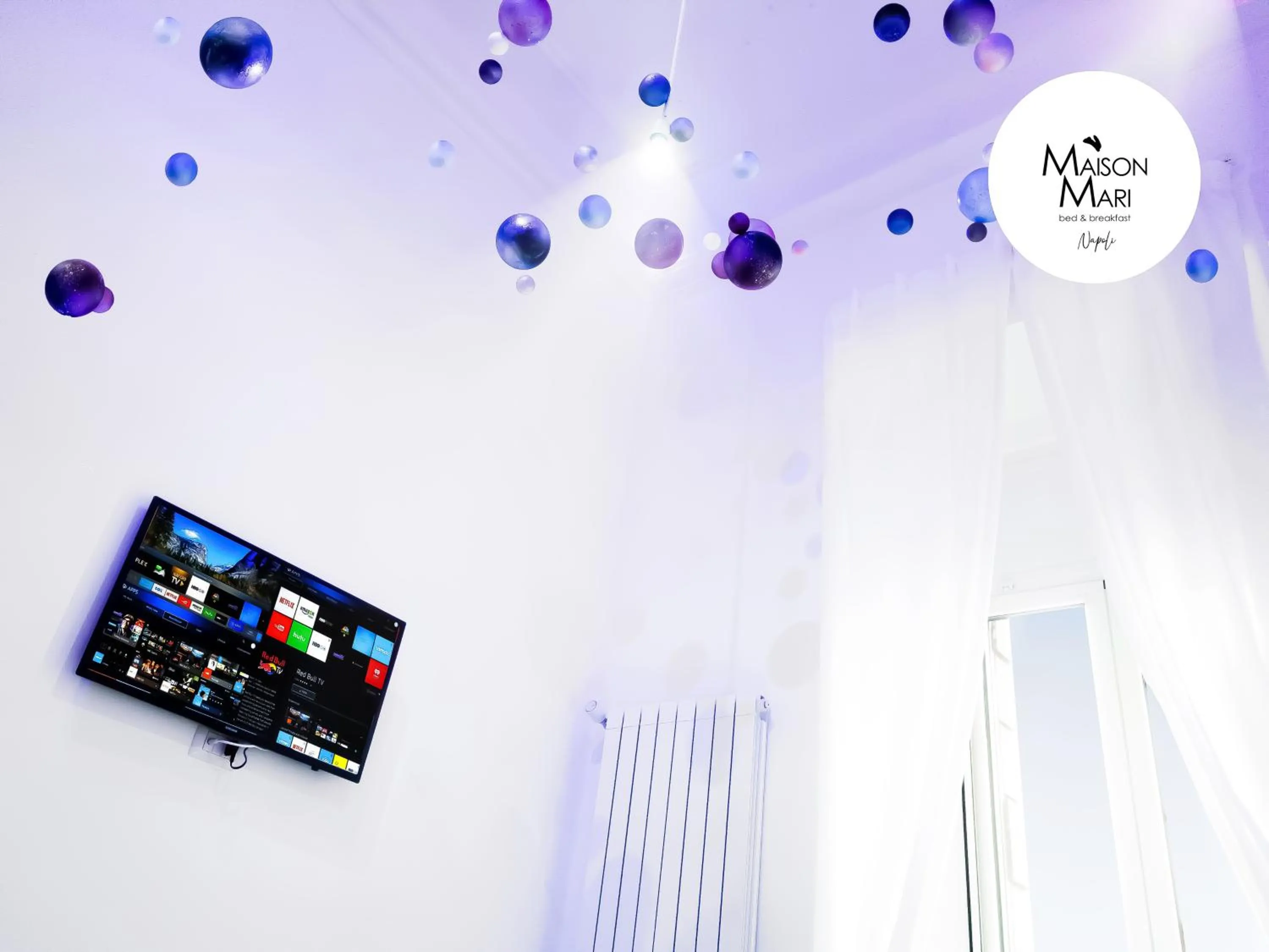 TV and multimedia in B&B Maison Mari