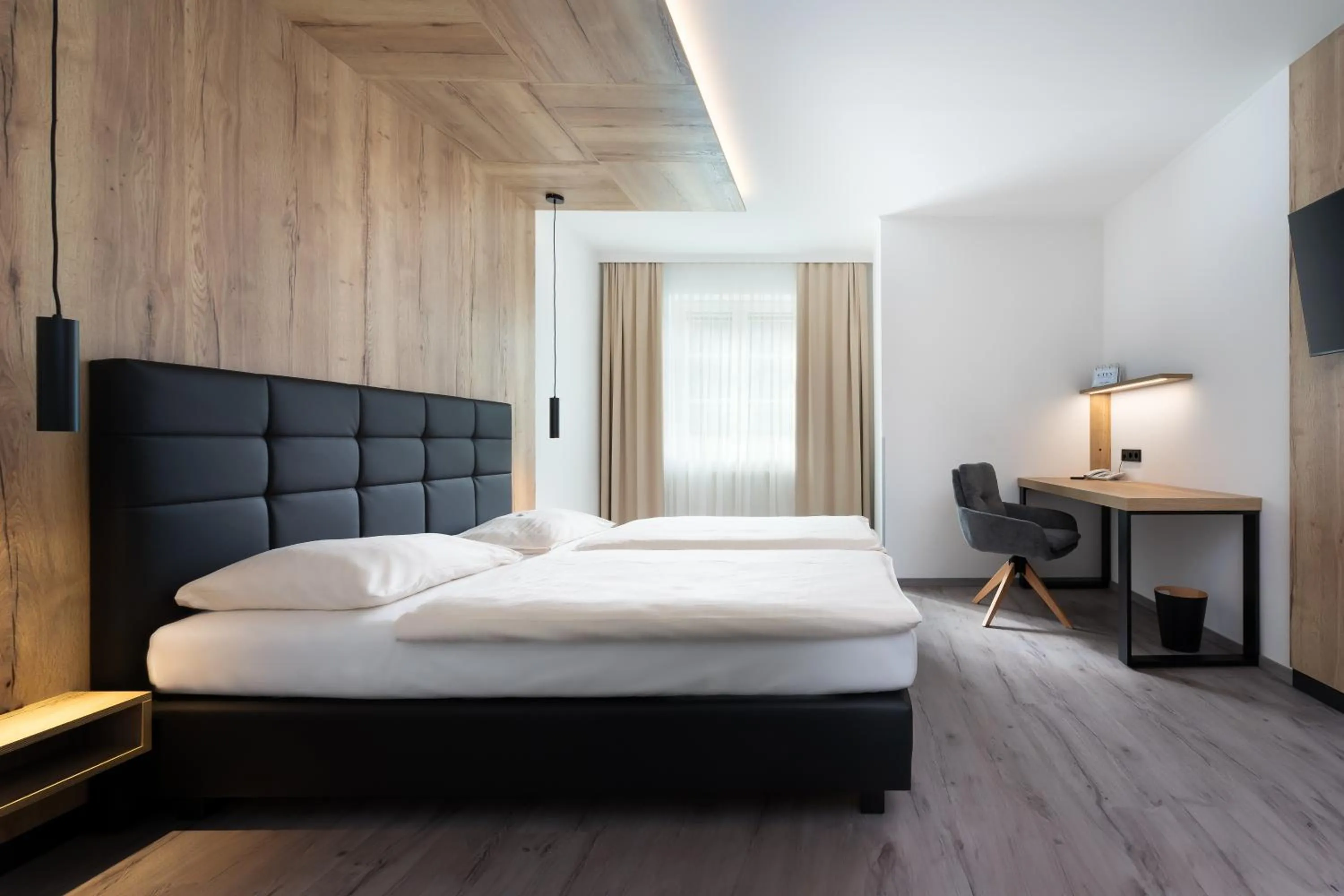 Bed in City Hotel Stockerau