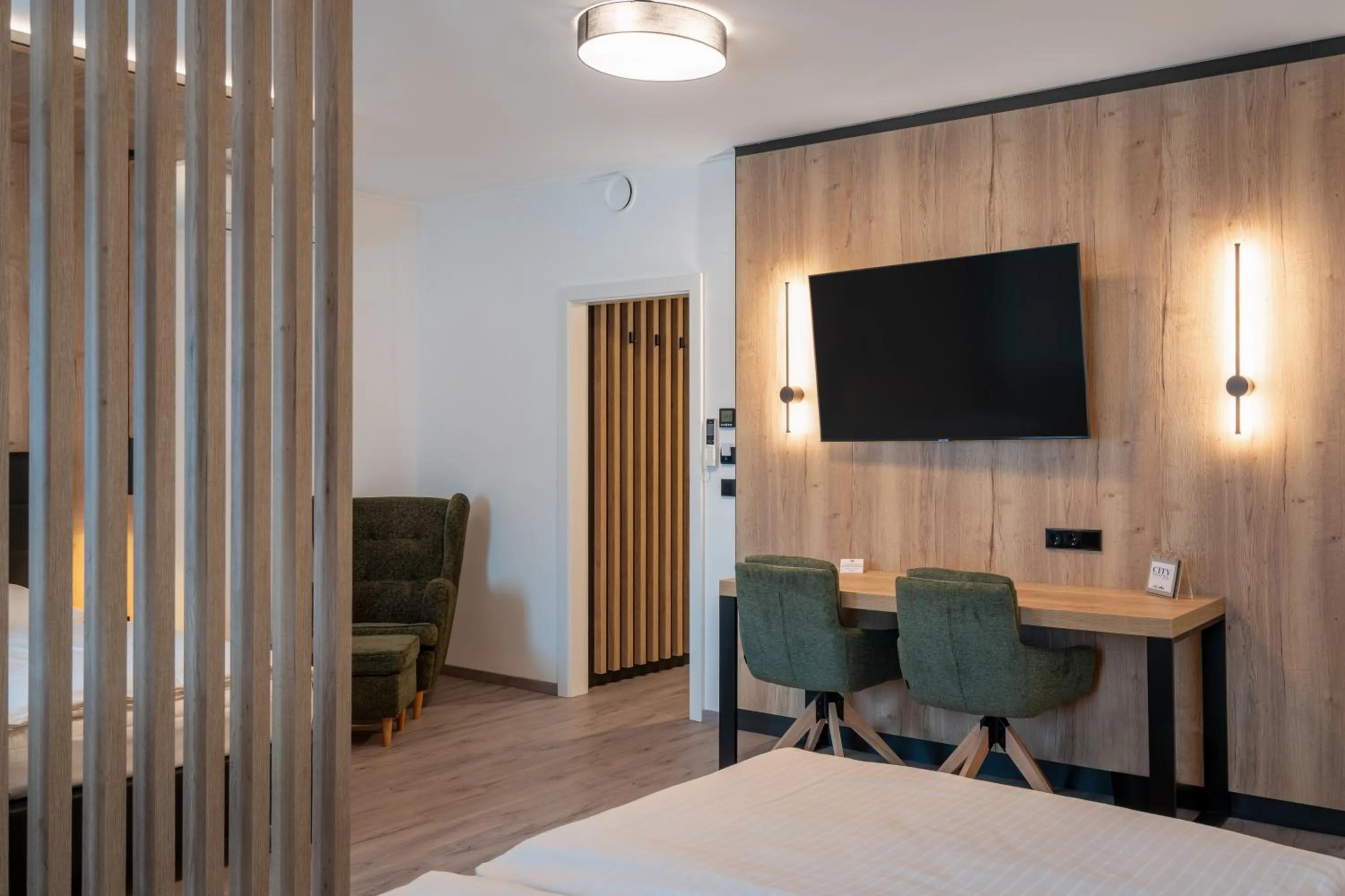 Bed in City Hotel Stockerau