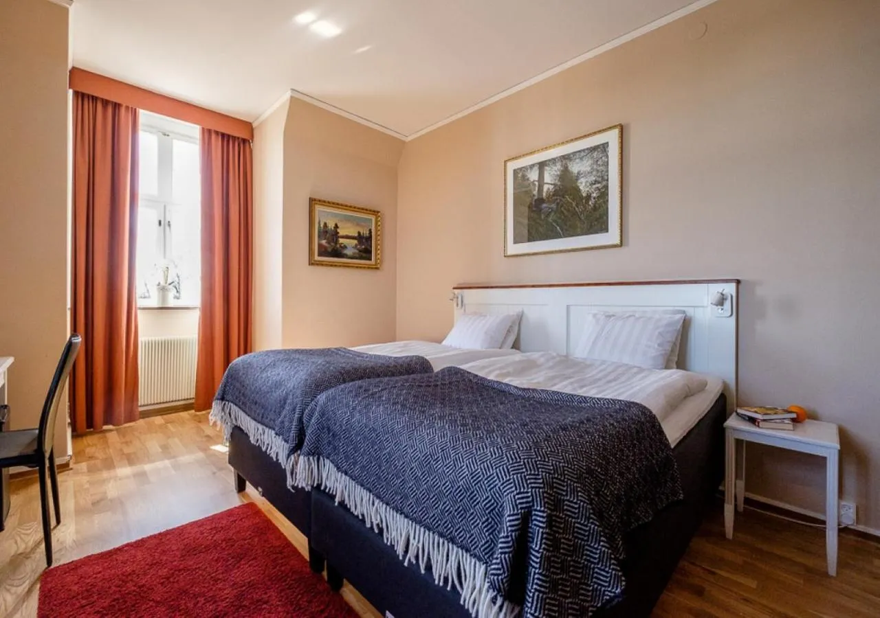 Photo of the whole room, Bed in Eksjö Stadshotell
