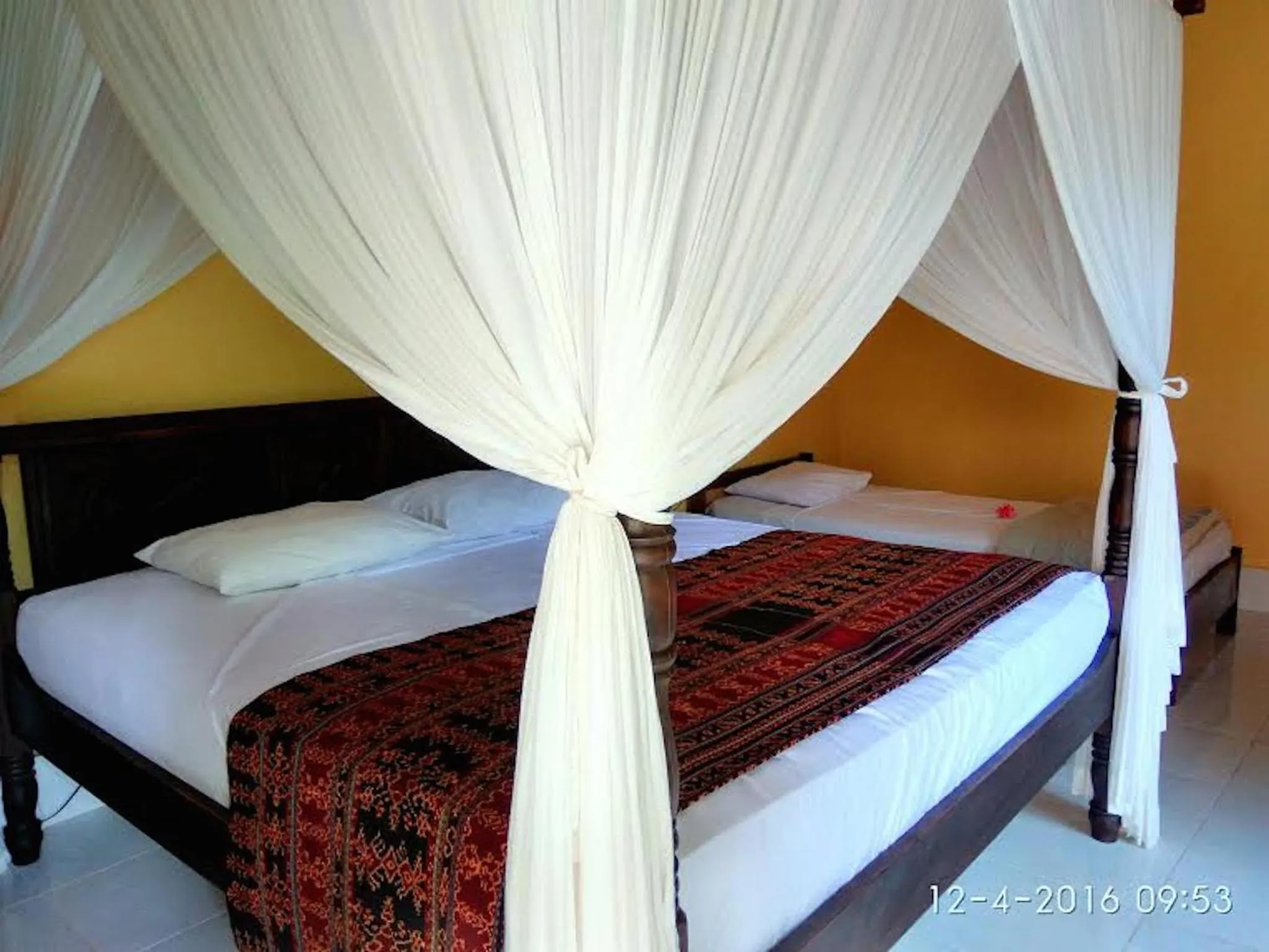 Bed in Sea World Club Beach Resort & Dive Center, RESORT THAT SUPPORTS THE POOR