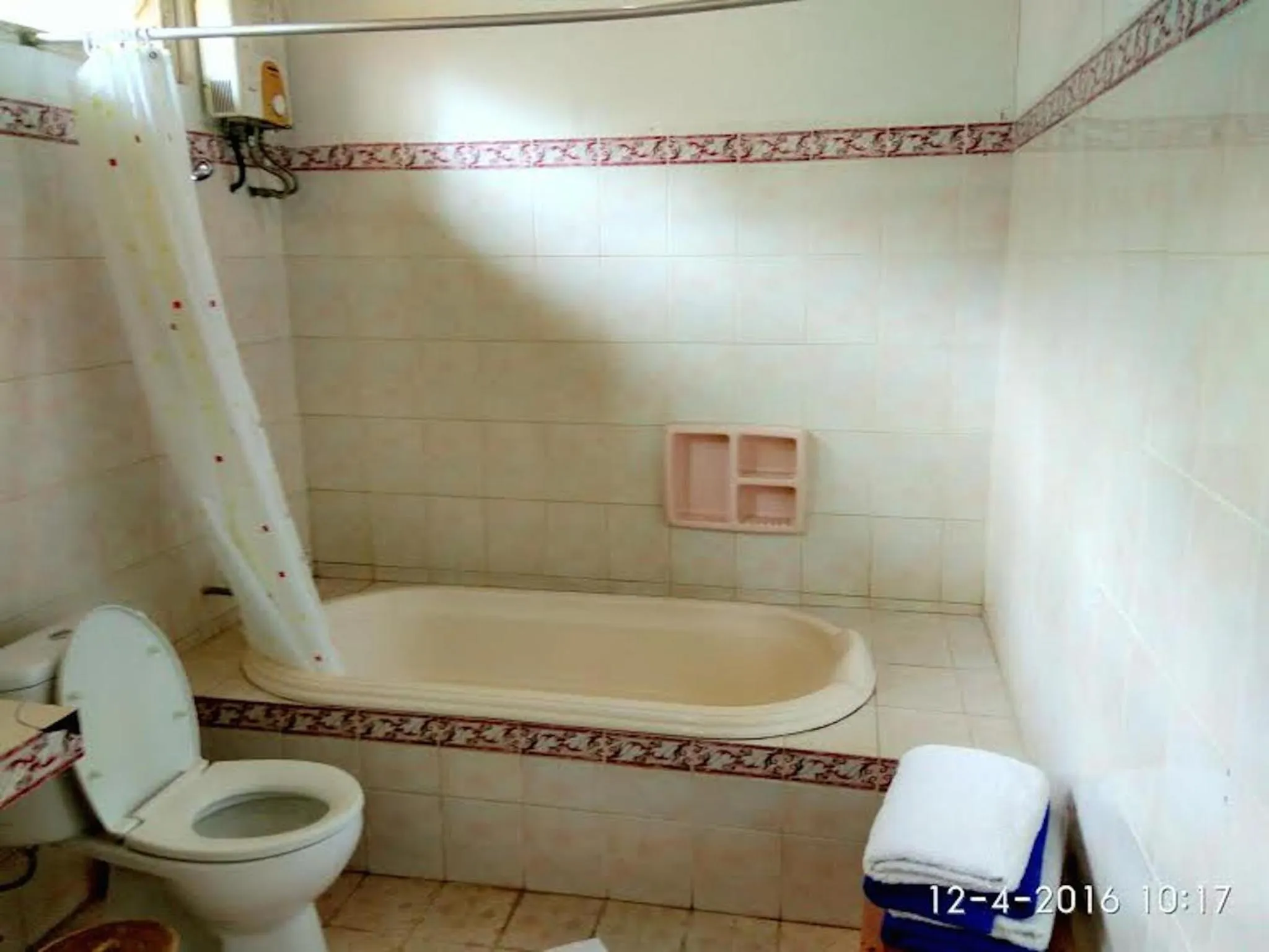 Shower in Sea World Club Beach Resort & Dive Center, RESORT THAT SUPPORTS THE POOR