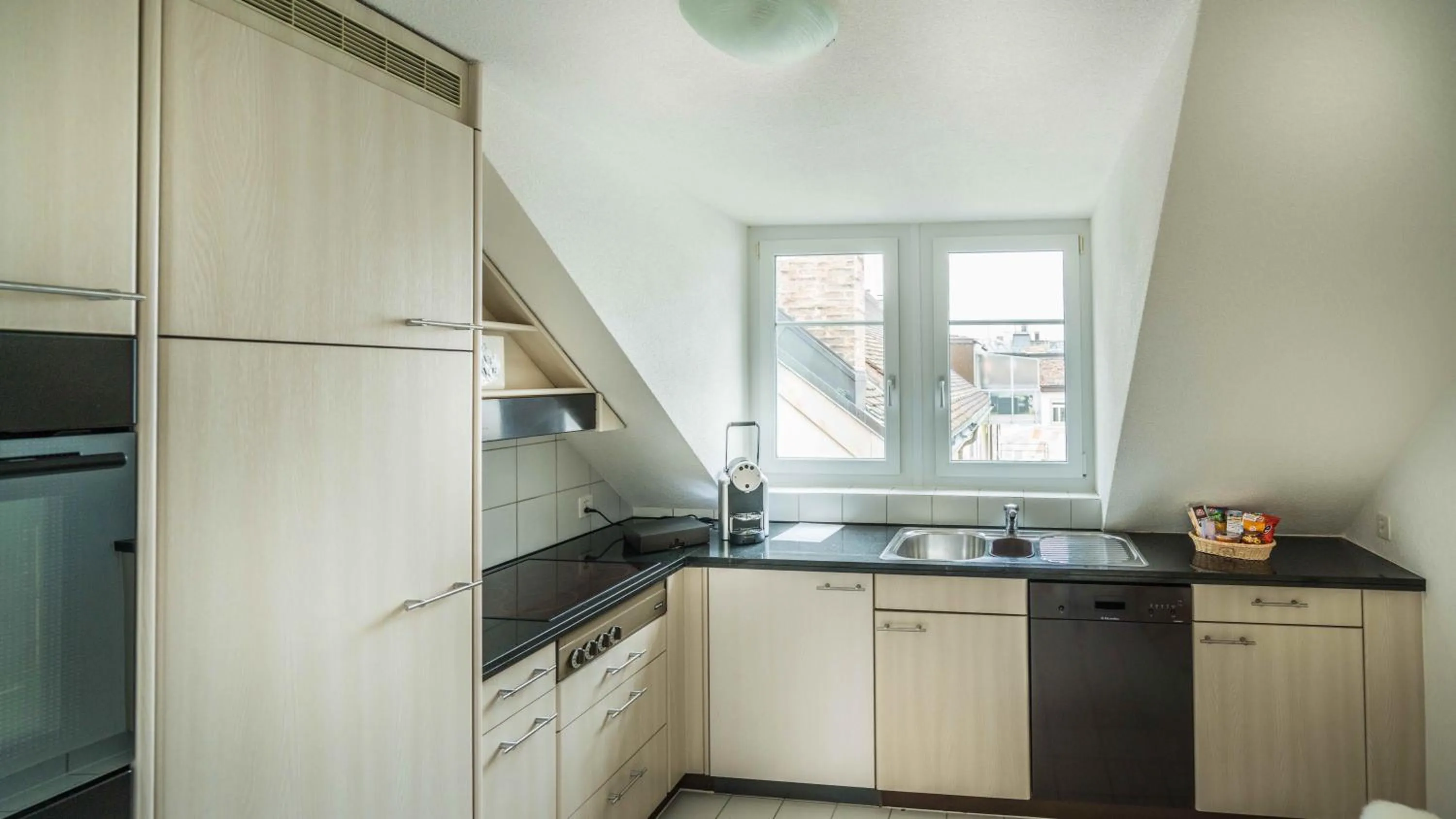 Kitchen or kitchenette in Löwenplatz Apartment near Station by Airhome
