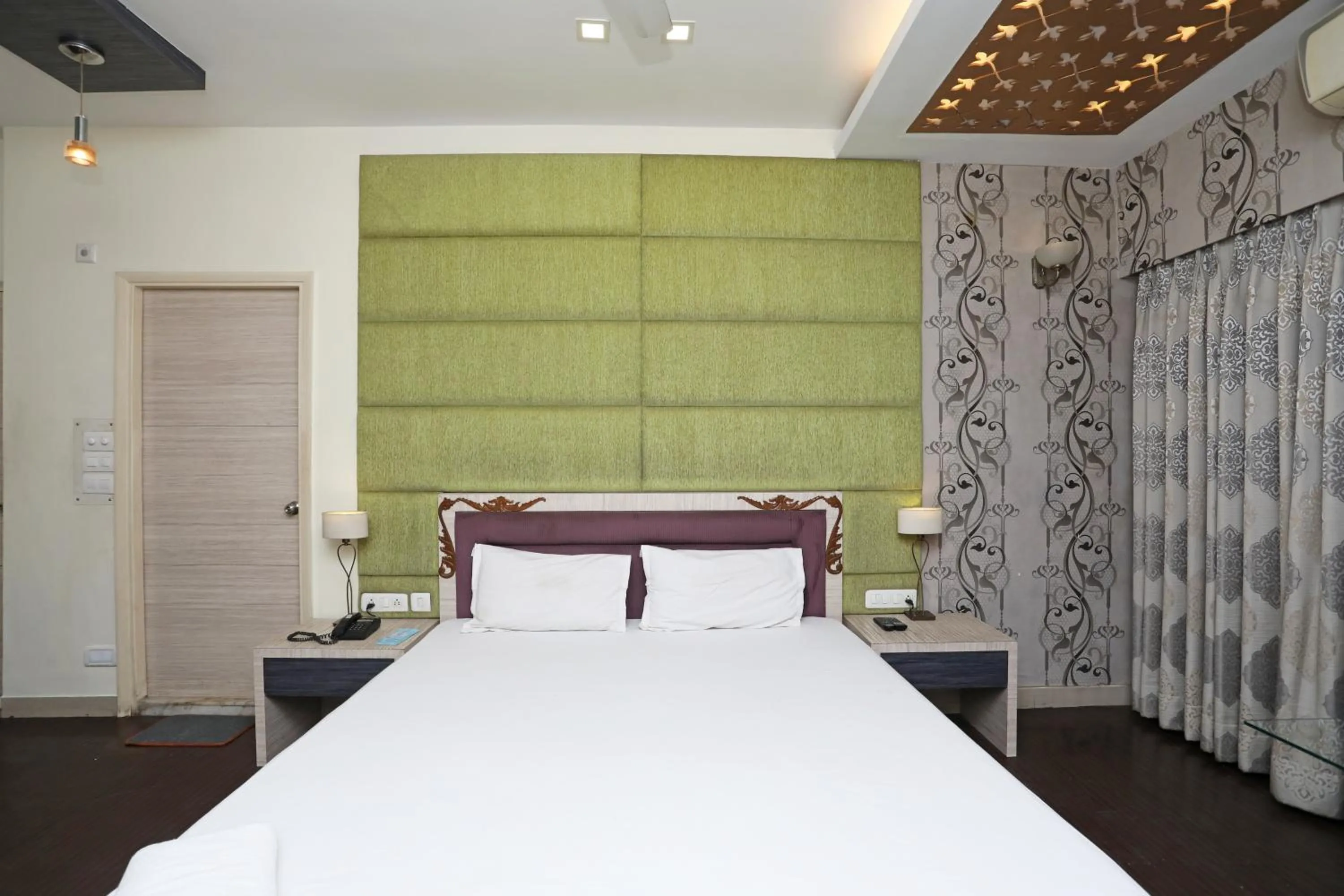 Photo of the whole room, Bed in Hotel Rushabh Home