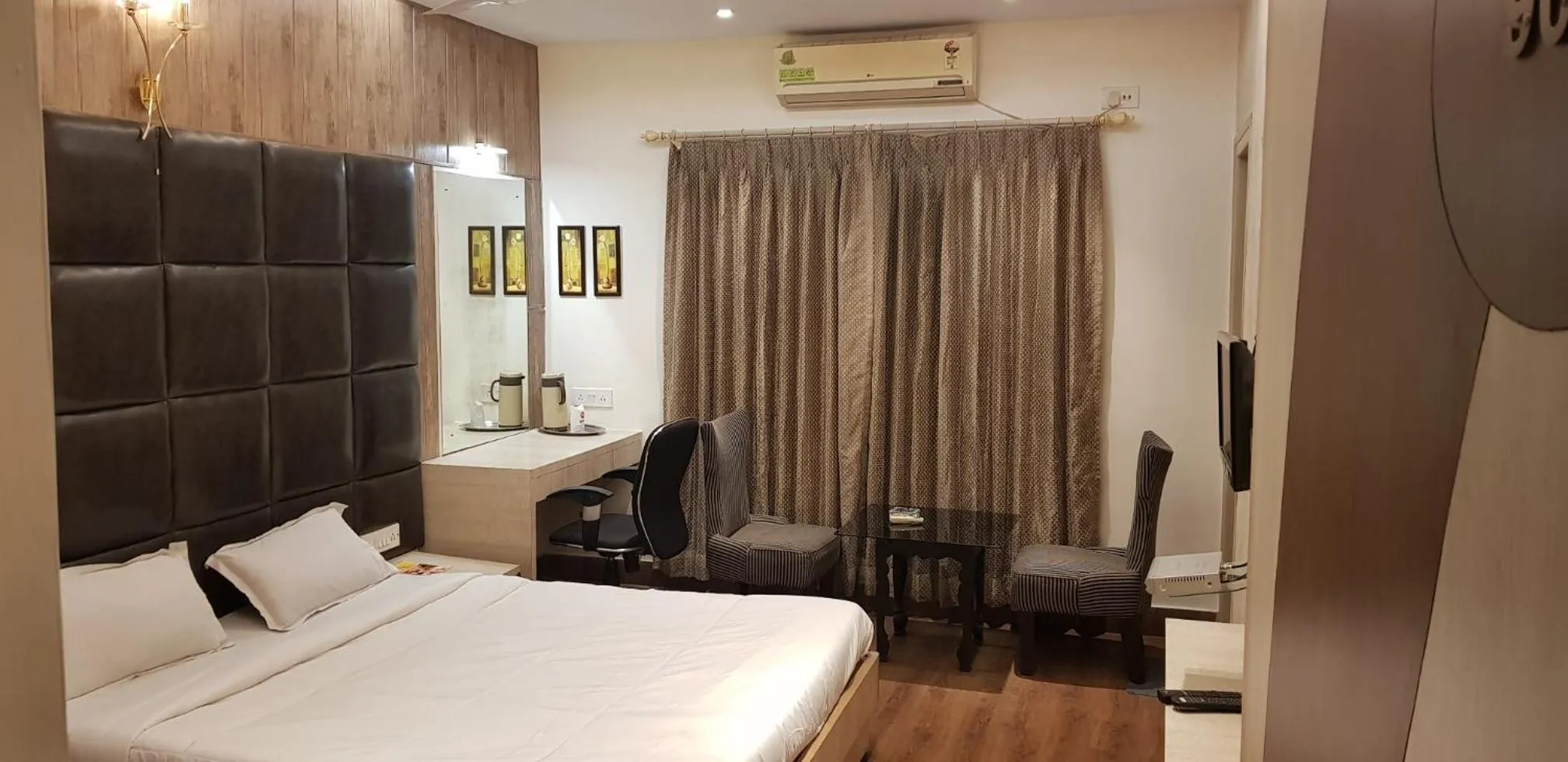 Photo of the whole room, Bed in Hotel Rushabh Home