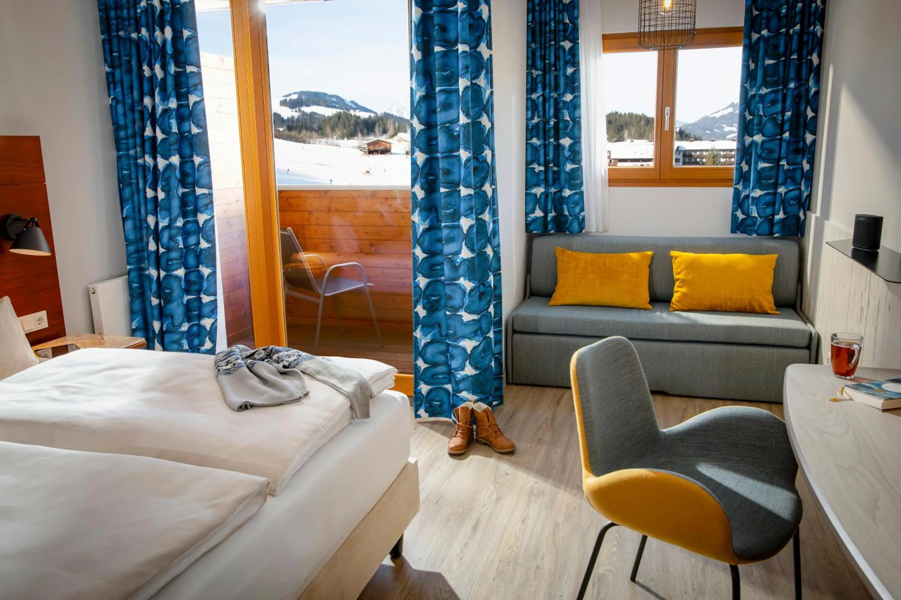 Living room, Bed in TUI BLUE Fieberbrunn