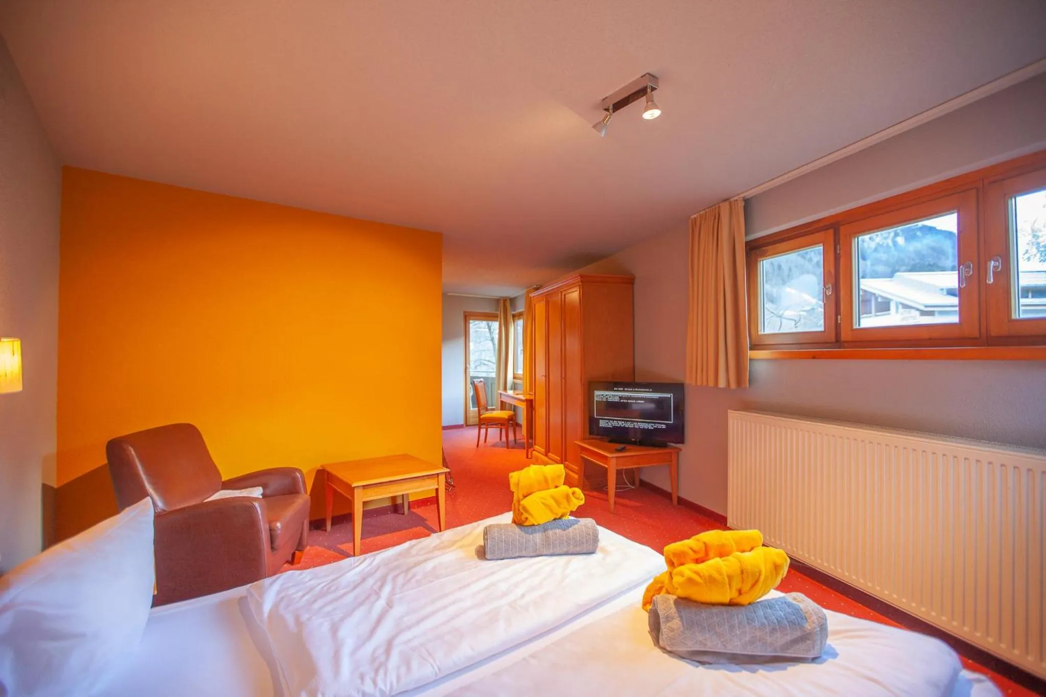 Photo of the whole room, Bed in Walliserhof