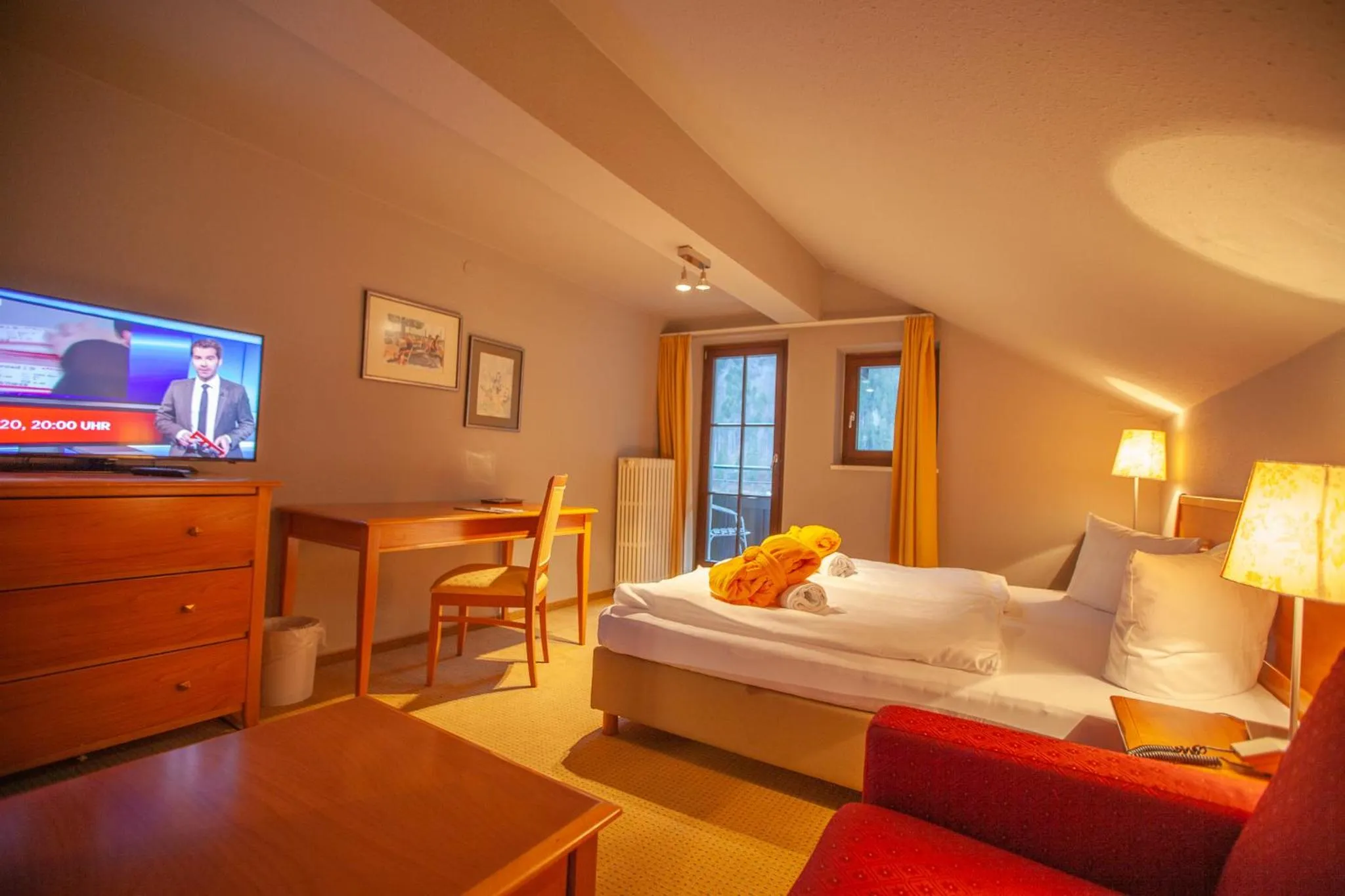 Photo of the whole room, Bed in Walliserhof